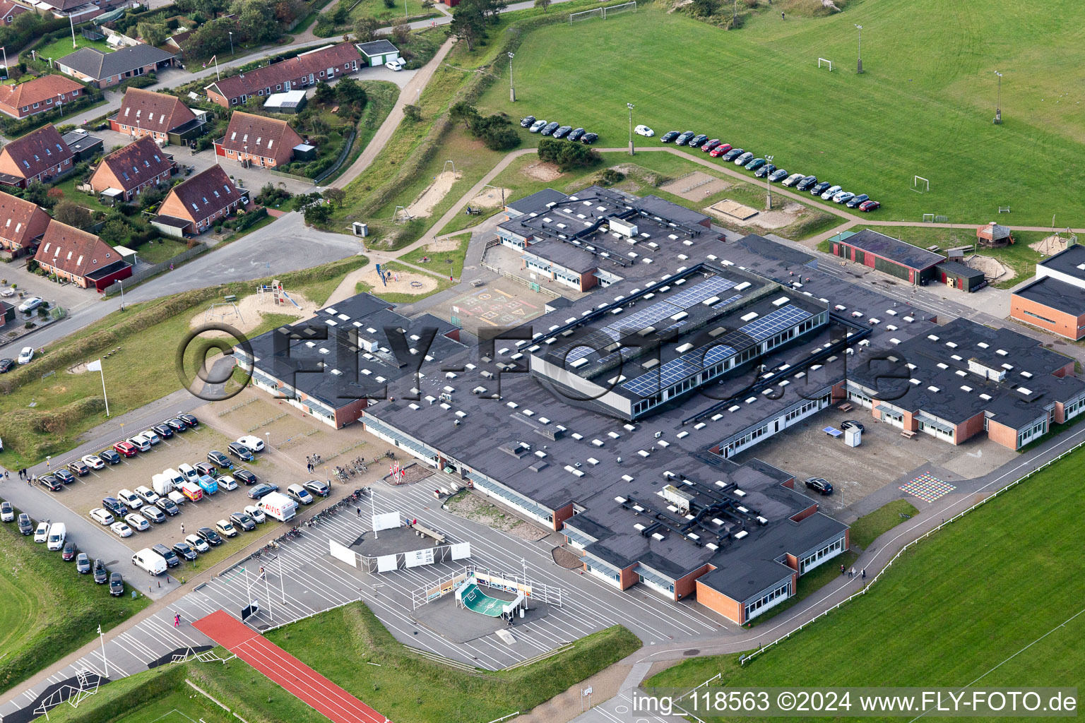 School and library in the district Nordby in Fanø in the state South Denmark, Denmark from above