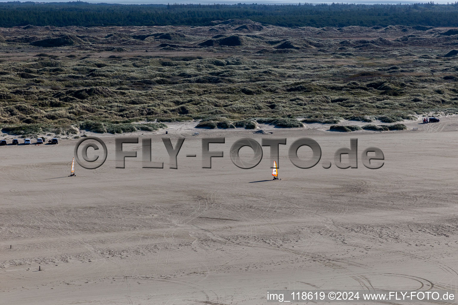 Buggies and kiters on the sandy beach in Fanø in the state South Denmark, Denmark