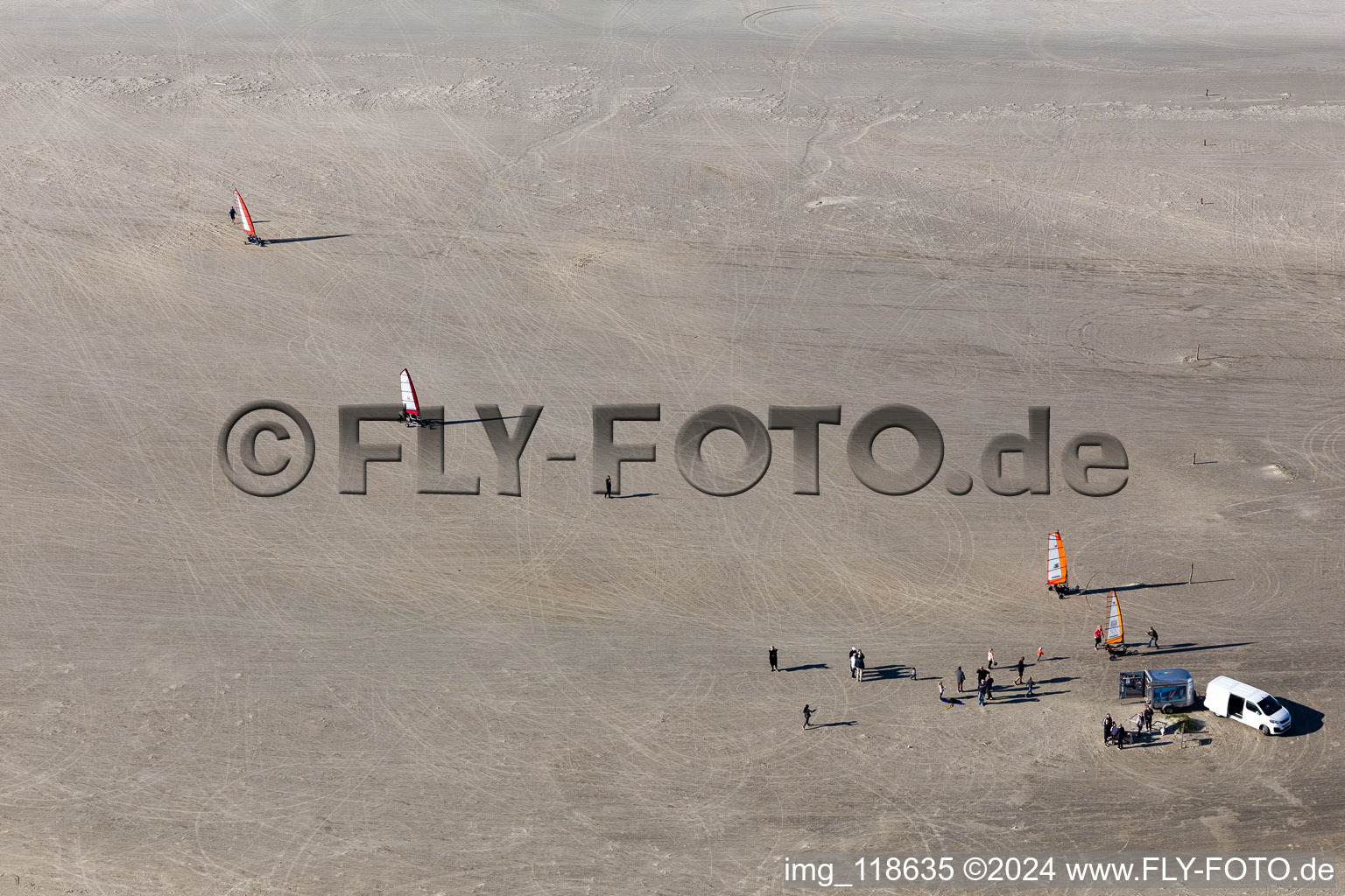 Buggies and kiters on the sandy beach in Fanø in the state South Denmark, Denmark seen from above