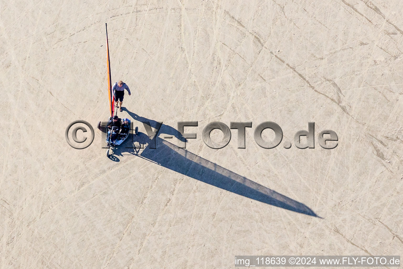 Drone recording of Buggies and kiters on the sandy beach in Fanø in the state South Denmark, Denmark