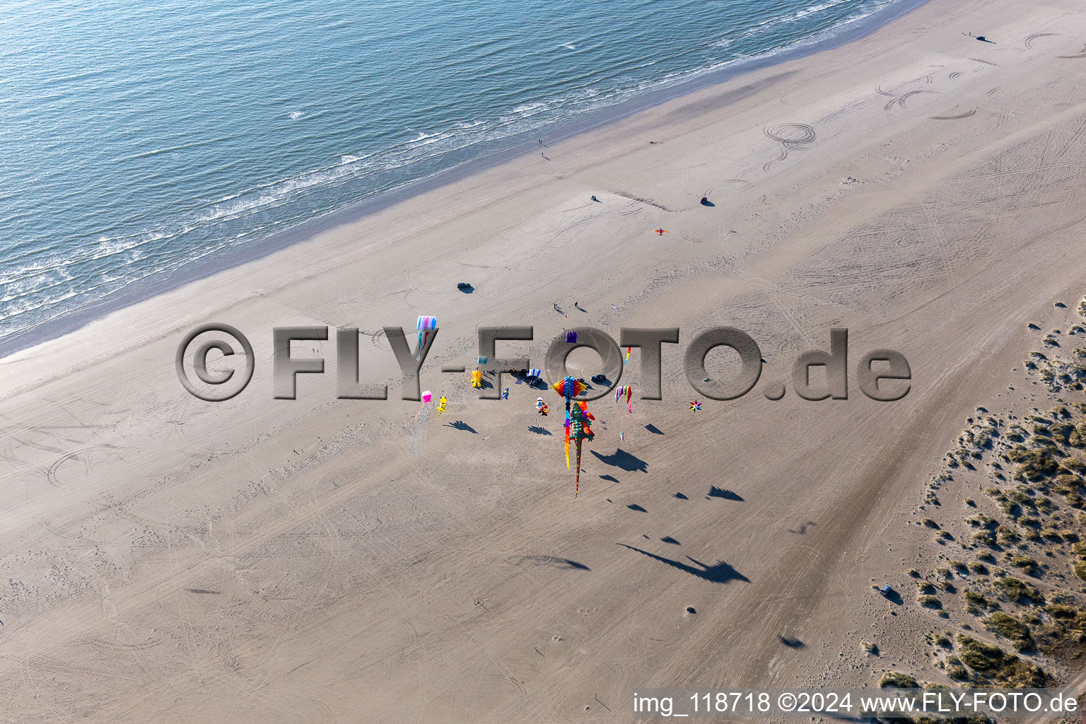 Aerial view of Coulourful Kites over the Beach along the West coast of Northsea island in Fanoe in, Denmark