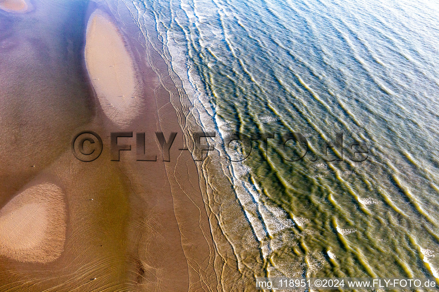 Aerial view of West beach at high tide in Fanø in the state South Denmark, Denmark