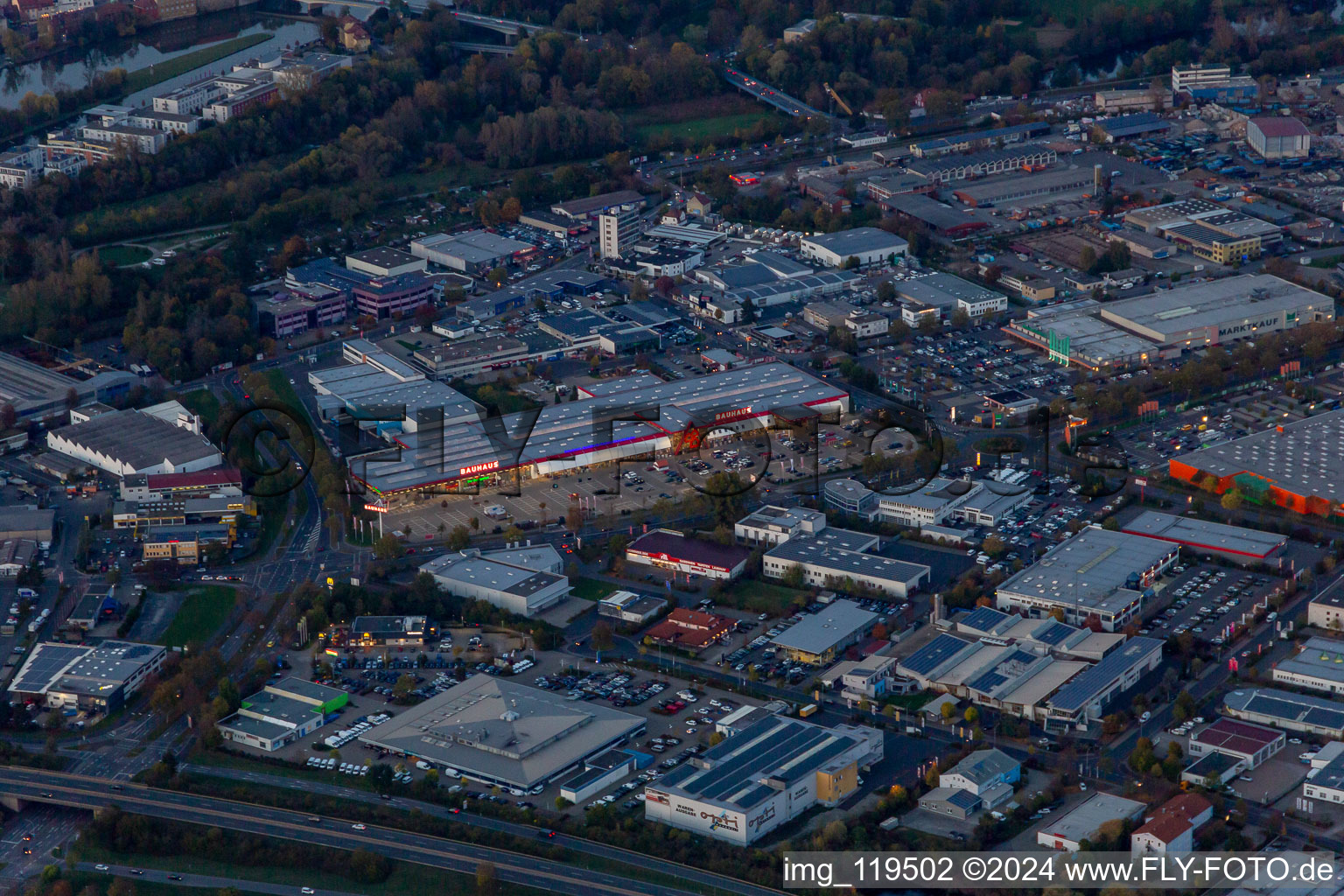 Building of the construction market BAUHAUS Schweinfurt and Marktkauf Schweinfurt at dusk in Schweinfurt in the state Bavaria, Germany