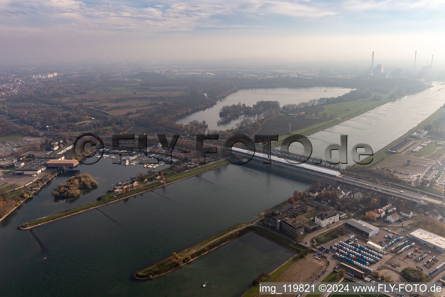 Rail and Street bridges with a huge tent for renovation purposes across the Rhine river between Karlsruhe and Woerth am Rhein in the state Rhineland-Palatinate, Germany