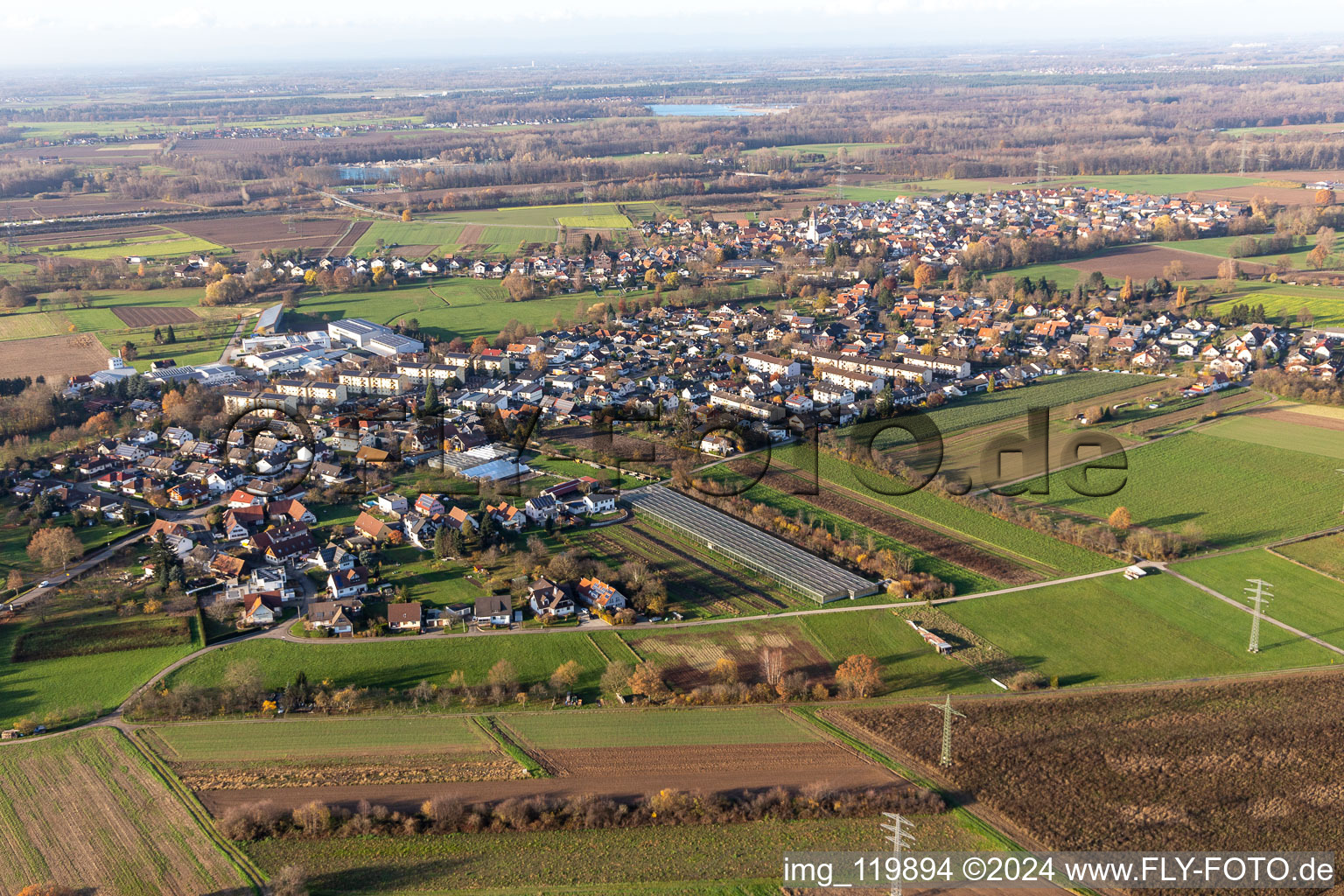 Agricultural land and field borders surround the settlement area of the village in Weitenung in the state Baden-Wurttemberg, Germany