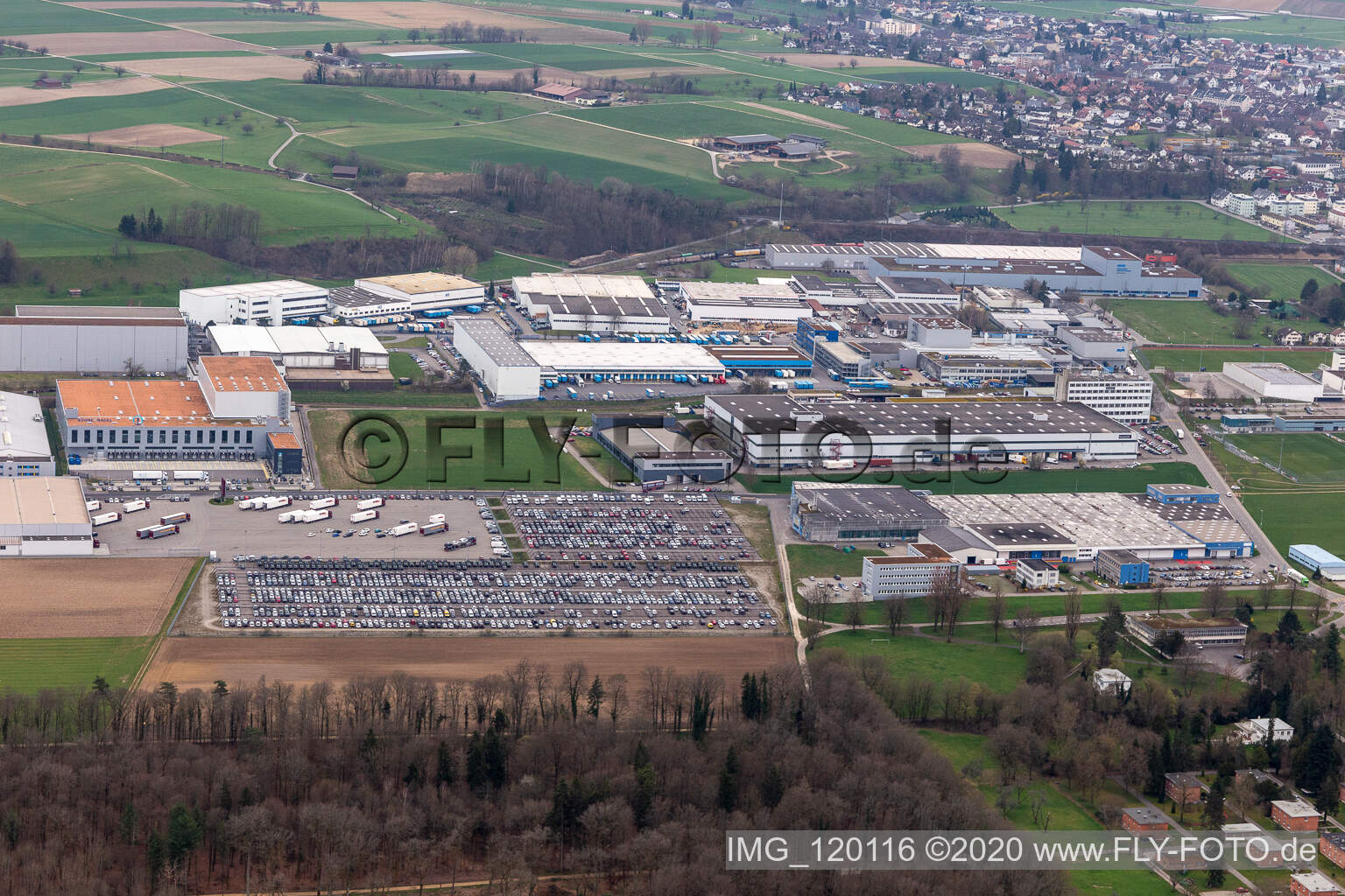 Aerial view of Technical facilities in the industrial area Riburg with Rodi Fructus, Kuehne + Nagel, DPD, Galliker Transport AG and Louis Ditzler AG in Moehlin in the canton Aargau, Switzerland