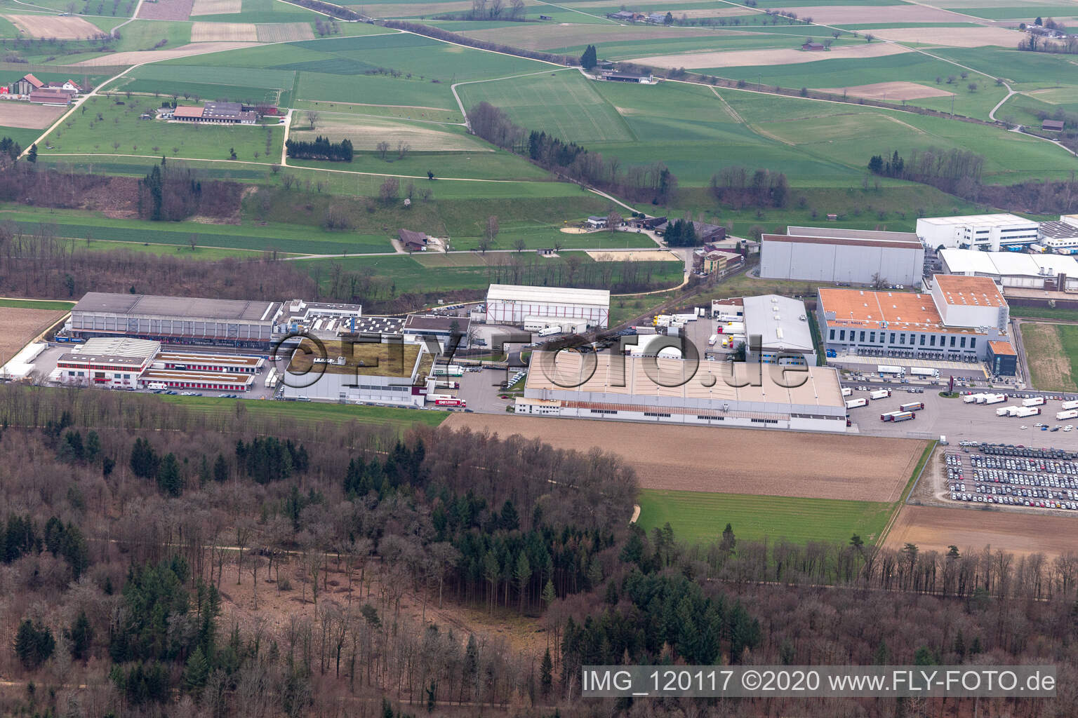 Aerial photograpy of Technical facilities in the industrial area Riburg with Rodi Fructus, Kuehne + Nagel, DPD, Galliker Transport AG and Louis Ditzler AG in Moehlin in the canton Aargau, Switzerland
