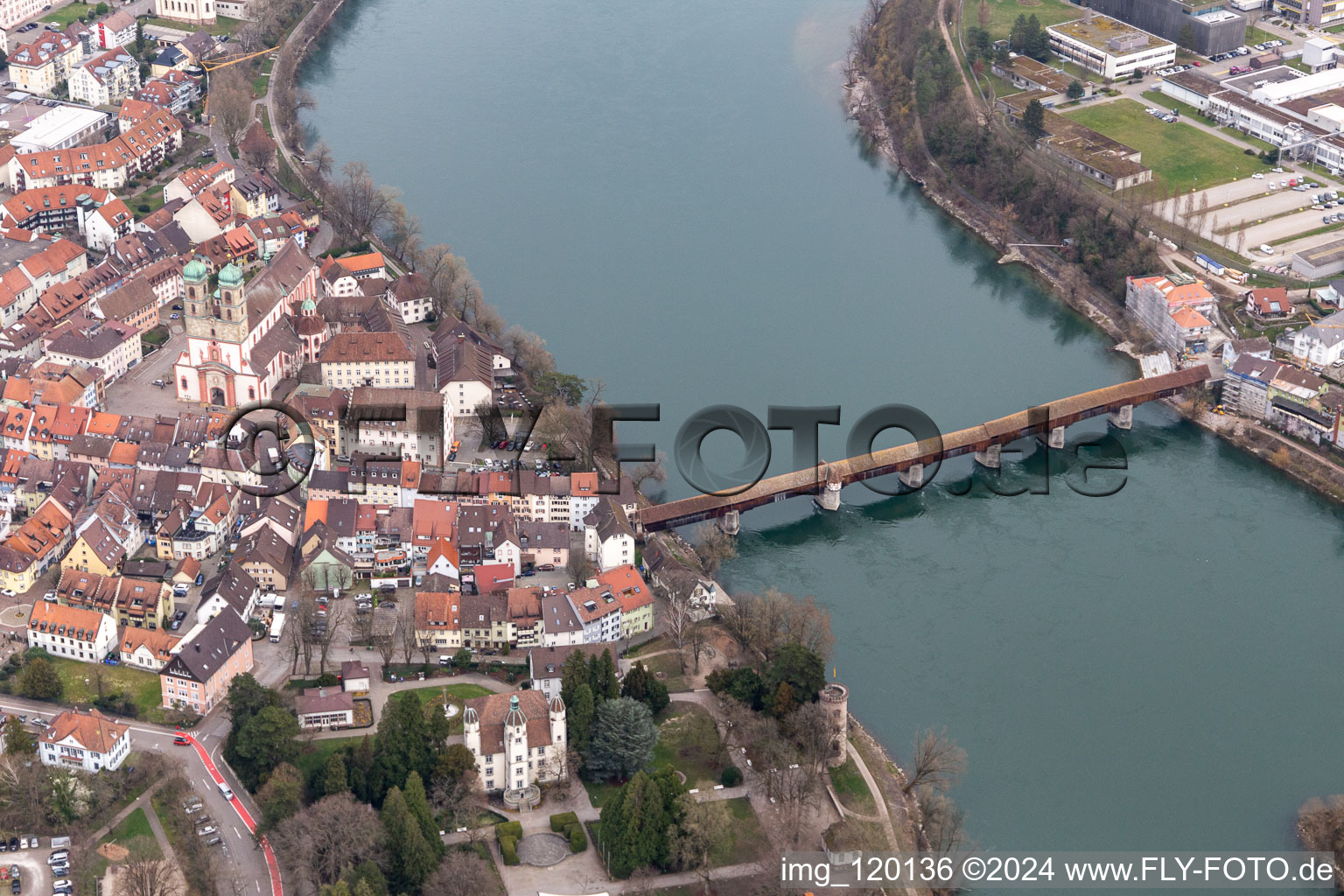 City center with old town and Castle Schoenau and the historic bridge to Switzerland crossing the river Rhine in Bad Saeckingen in the state Baden-Wurttemberg, Germany