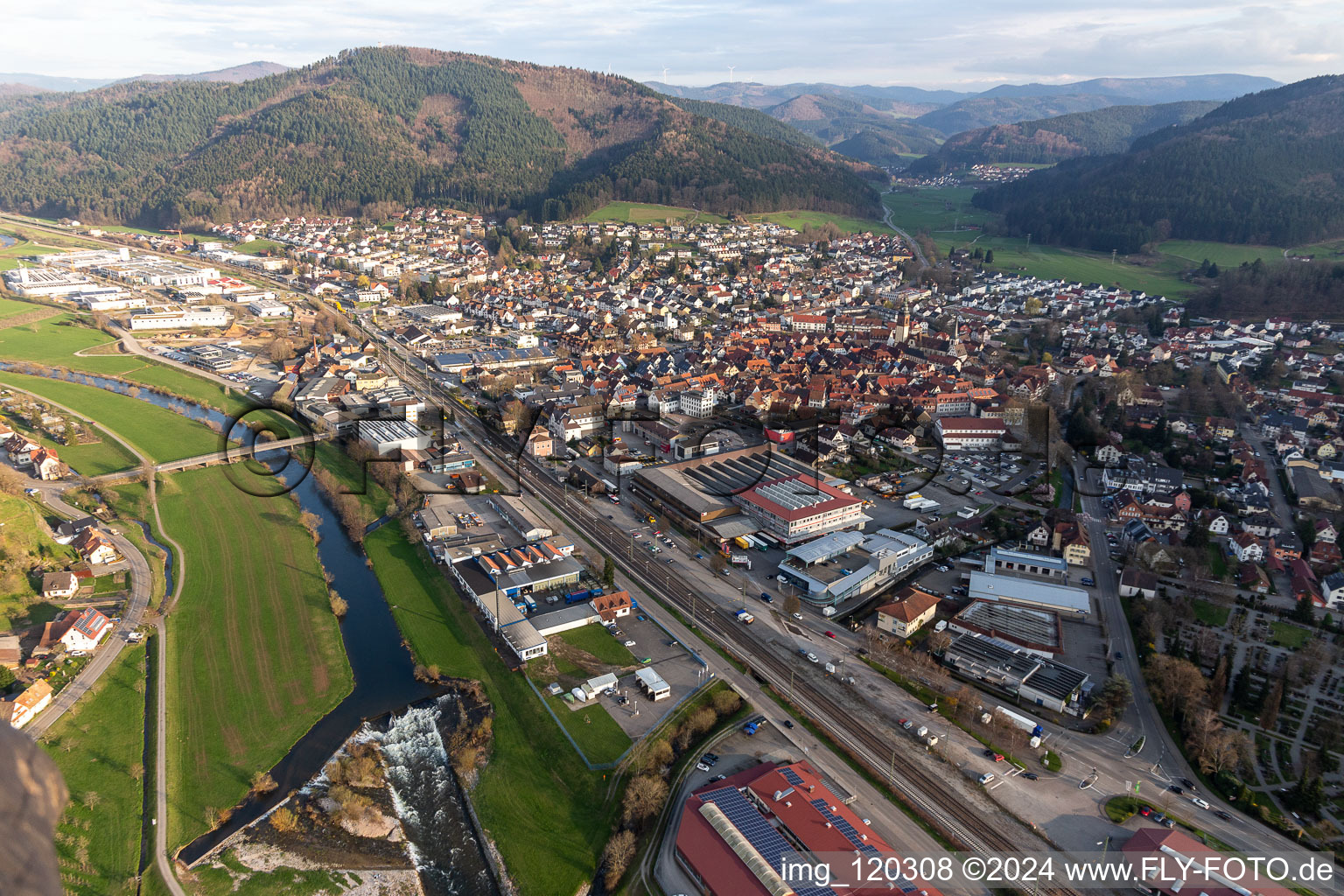 Village on the banks of the area of the Kinzig river course in Haslach im Kinzigtal in the state Baden-Wuerttemberg, Germany