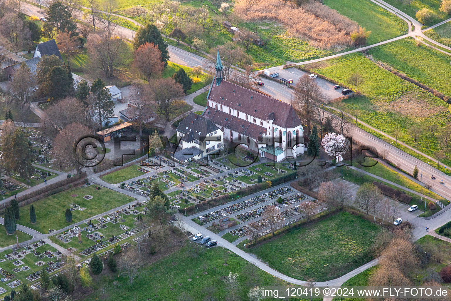 Grave rows on the grounds of the cemetery of Weingartenkirche in Offenburg in the state Baden-Wuerttemberg, Germany