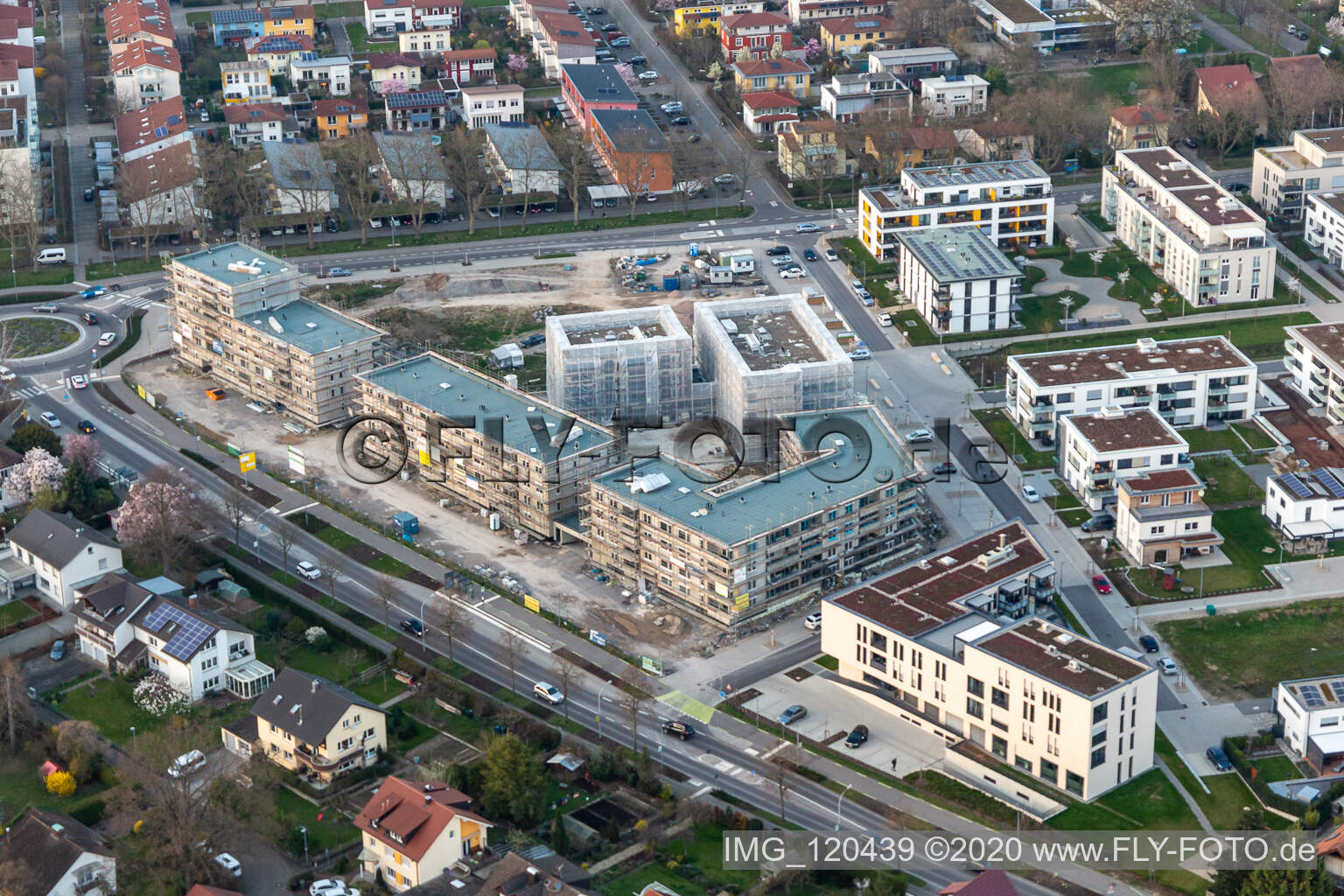 Oblique view of Construction site of a new residential area of the terraced housing estate Im Seidenfaden in Offenburg in the state Baden-Wuerttemberg, Germany