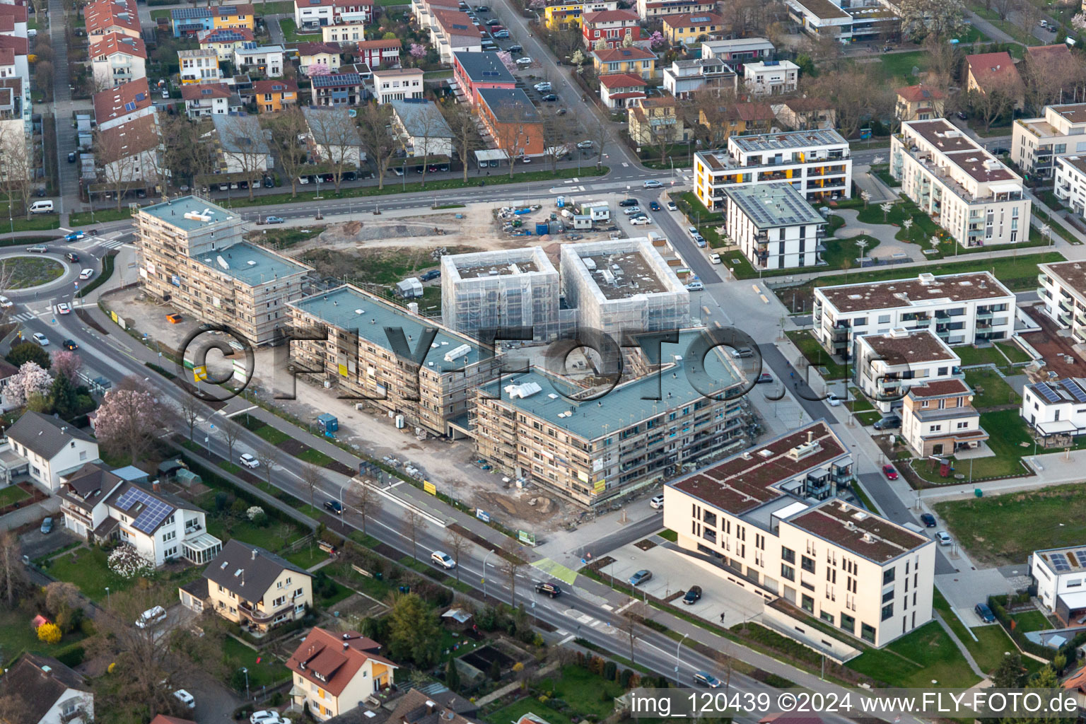 Oblique view of Construction site of a new residential area of the terraced housing estate Im Seidenfaden in Offenburg in the state Baden-Wuerttemberg, Germany