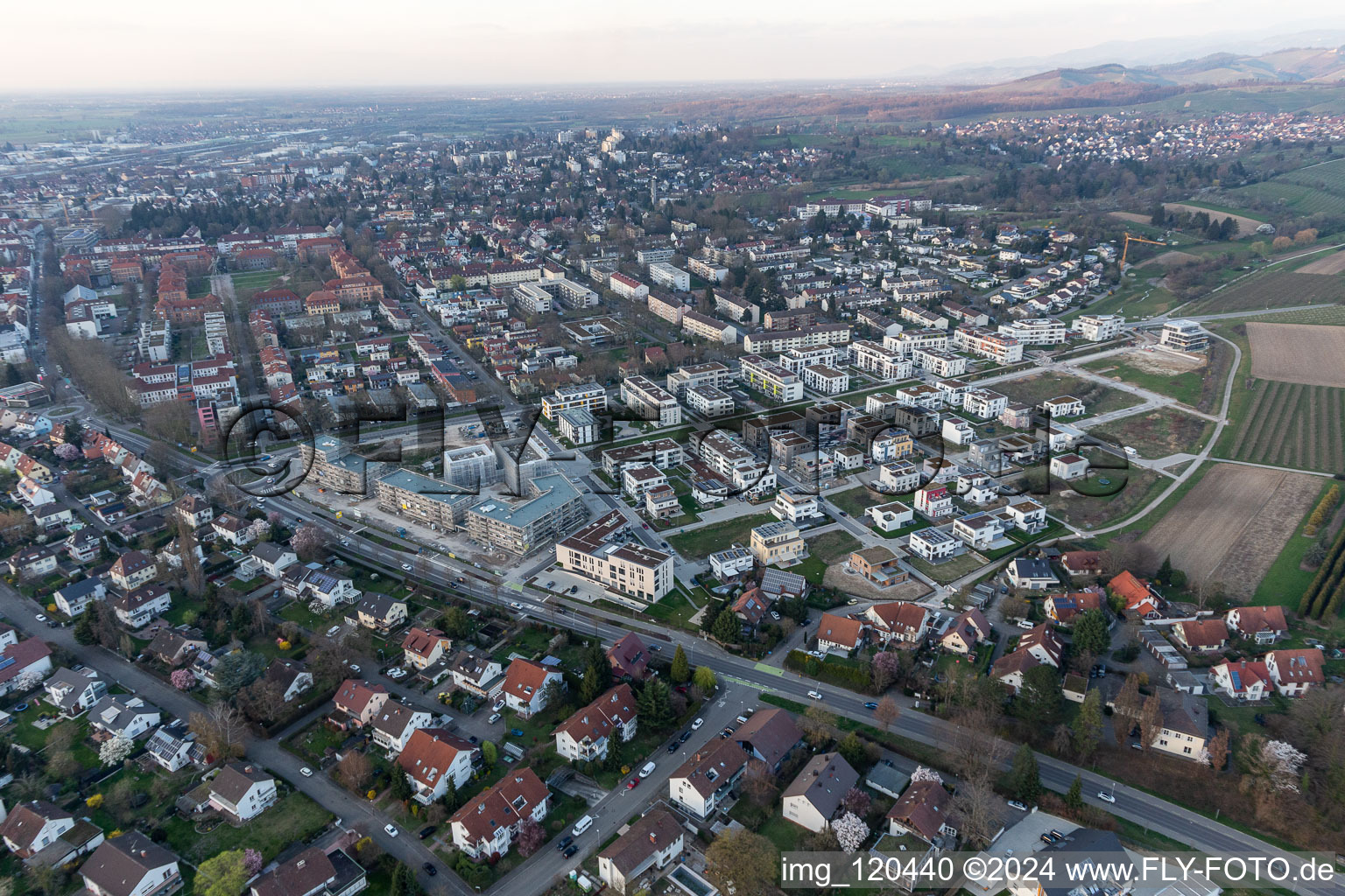 Construction site of a new residential area of the terraced housing estate Im Seidenfaden in Offenburg in the state Baden-Wuerttemberg, Germany from above