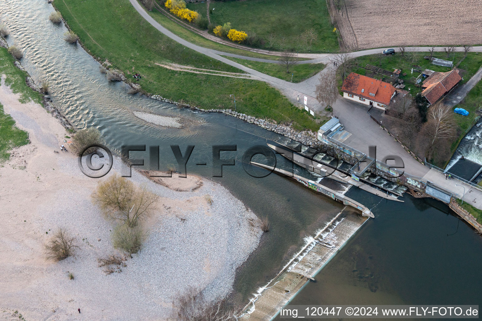 Weir on the banks of the flux flow Kinzig in the district Elgersweier in Offenburg in the state Baden-Wuerttemberg, Germany