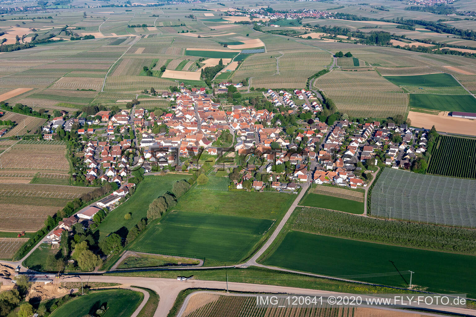 Aerial photograpy of Village - view on the edge of agricultural fields and farmland in Impflingen in the state Rhineland-Palatinate, Germany