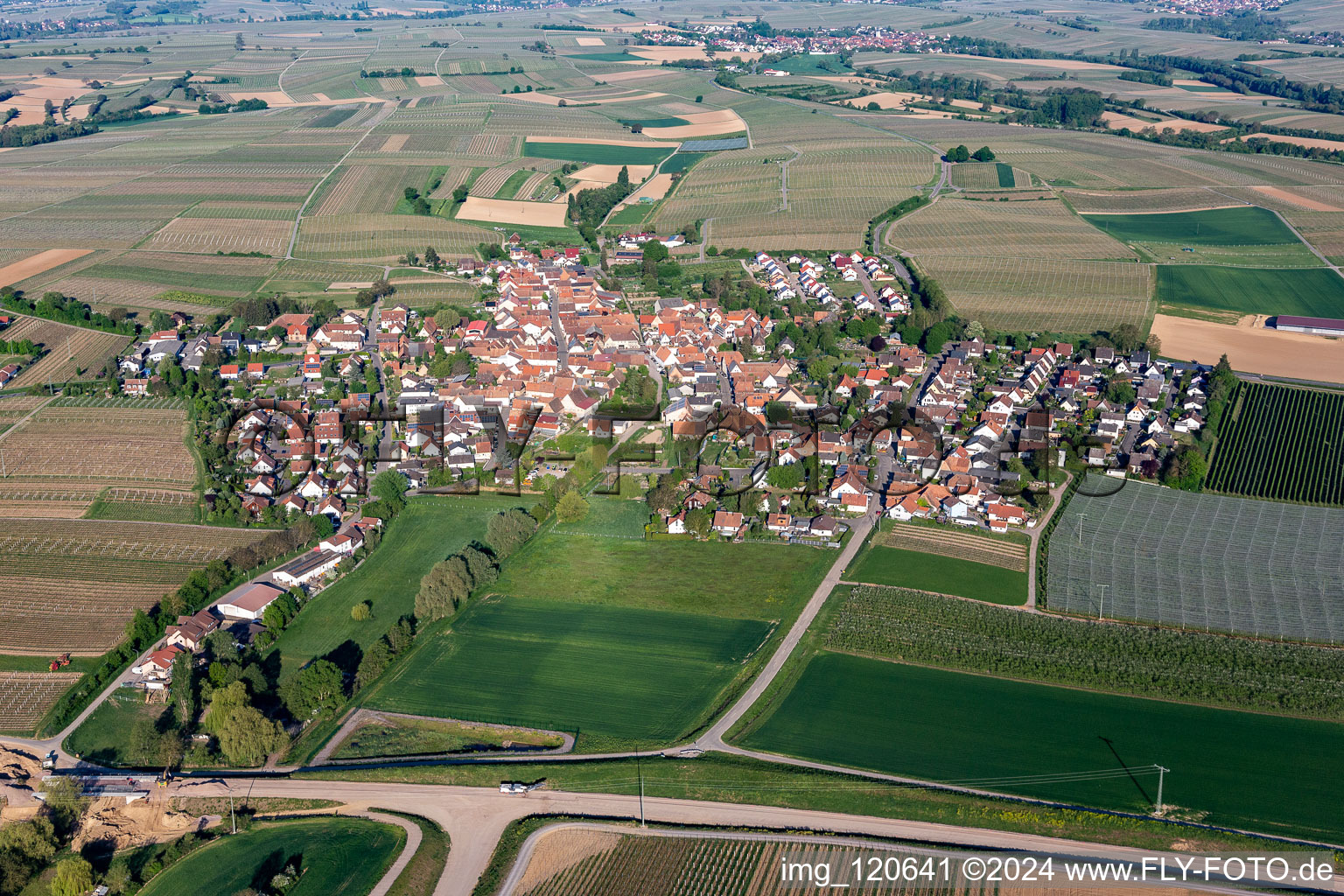 Aerial photograpy of Village - view on the edge of agricultural fields and farmland in Impflingen in the state Rhineland-Palatinate, Germany