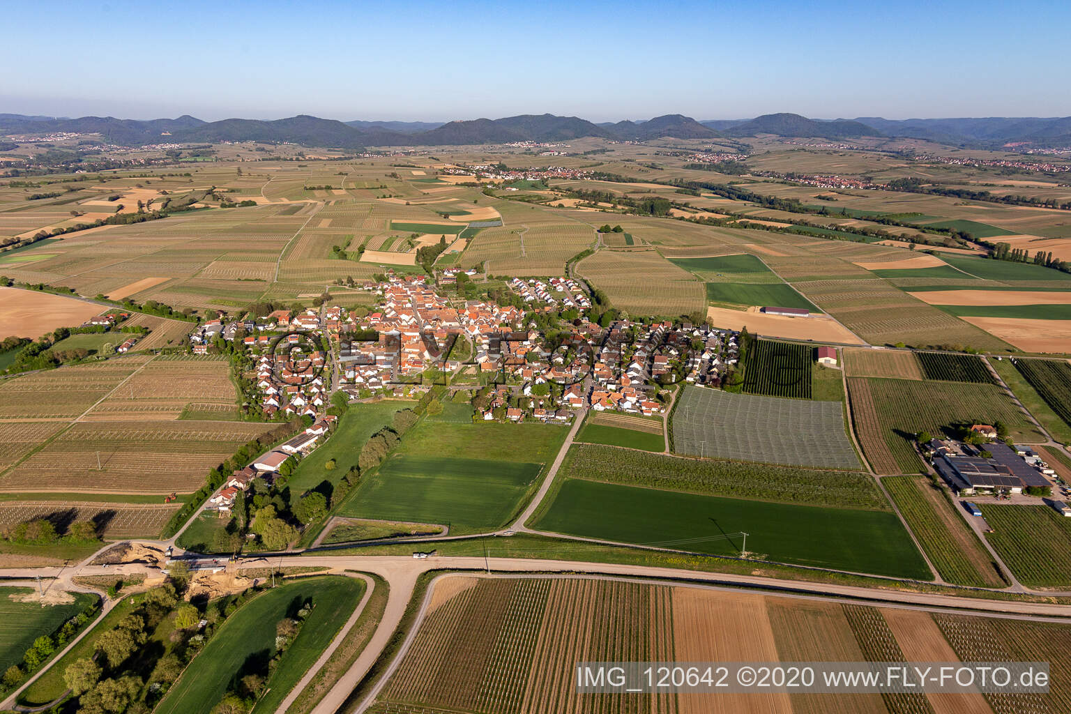 Village - view on the edge of agricultural fields and farmland in Impflingen in the state Rhineland-Palatinate, Germany