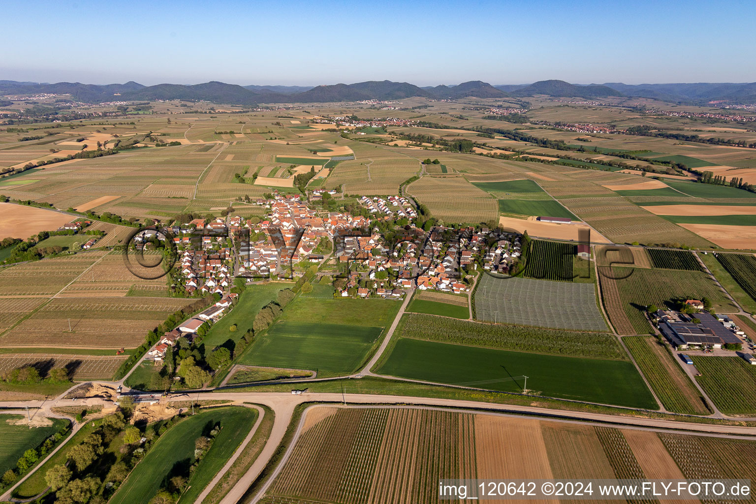 Village - view on the edge of agricultural fields and farmland in Impflingen in the state Rhineland-Palatinate, Germany