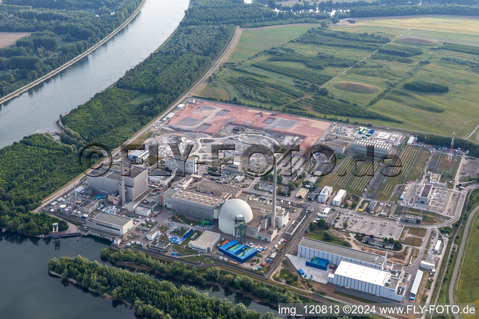 Aerial view of Remains of the decommissioned reactor blocks and facilities of the nuclear power plant - KKW Kernkraftwerk EnBW Kernkraft GmbH, Philippsburg nuclear power plant and rubble of the two cooling towers in Philippsburg in the state Baden-Wuerttemberg, Germany