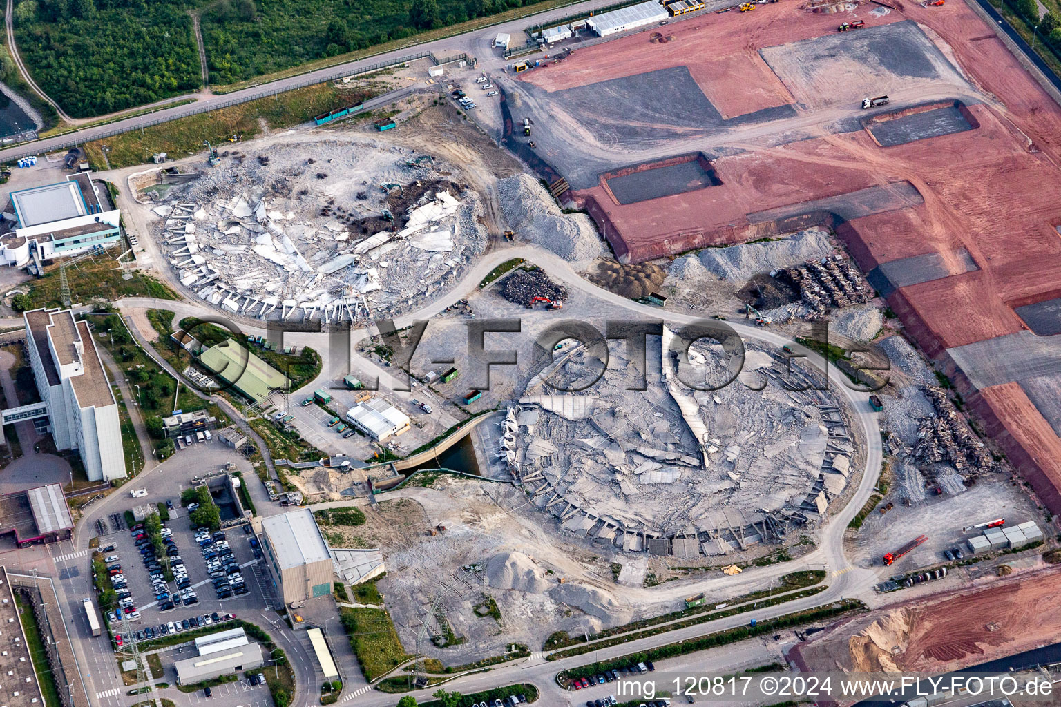 Aerial photograpy of Remains of the decommissioned reactor blocks and facilities of the nuclear power plant - KKW Kernkraftwerk EnBW Kernkraft GmbH, Philippsburg nuclear power plant and rubble of the two cooling towers in Philippsburg in the state Baden-Wuerttemberg, Germany