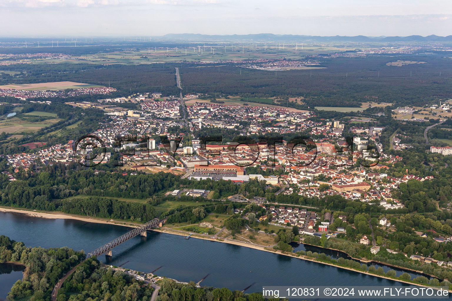 Aerial view of City view on the river bank of the Rhine river in Germersheim in the state Rhineland-Palatinate, Germany