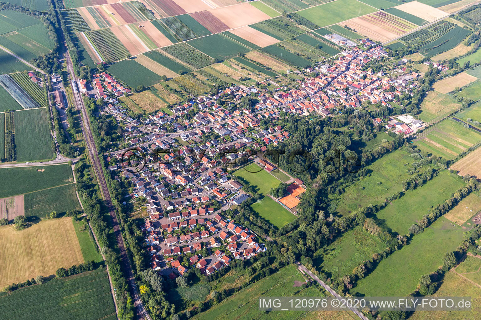 Village view on the edge of agricultural fields and land in Winden in the state Rhineland-Palatinate, Germany
