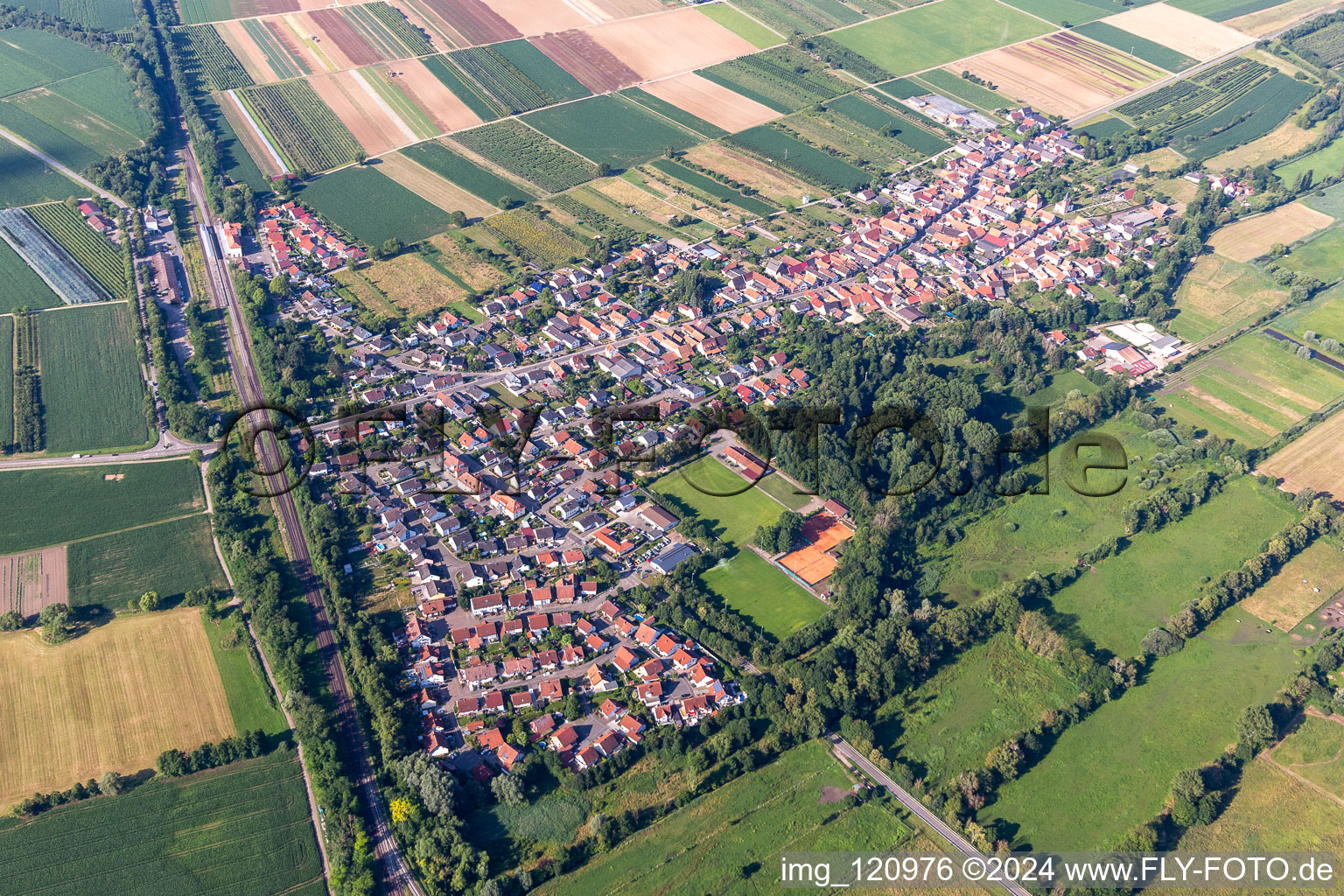 Village view on the edge of agricultural fields and land in Winden in the state Rhineland-Palatinate, Germany