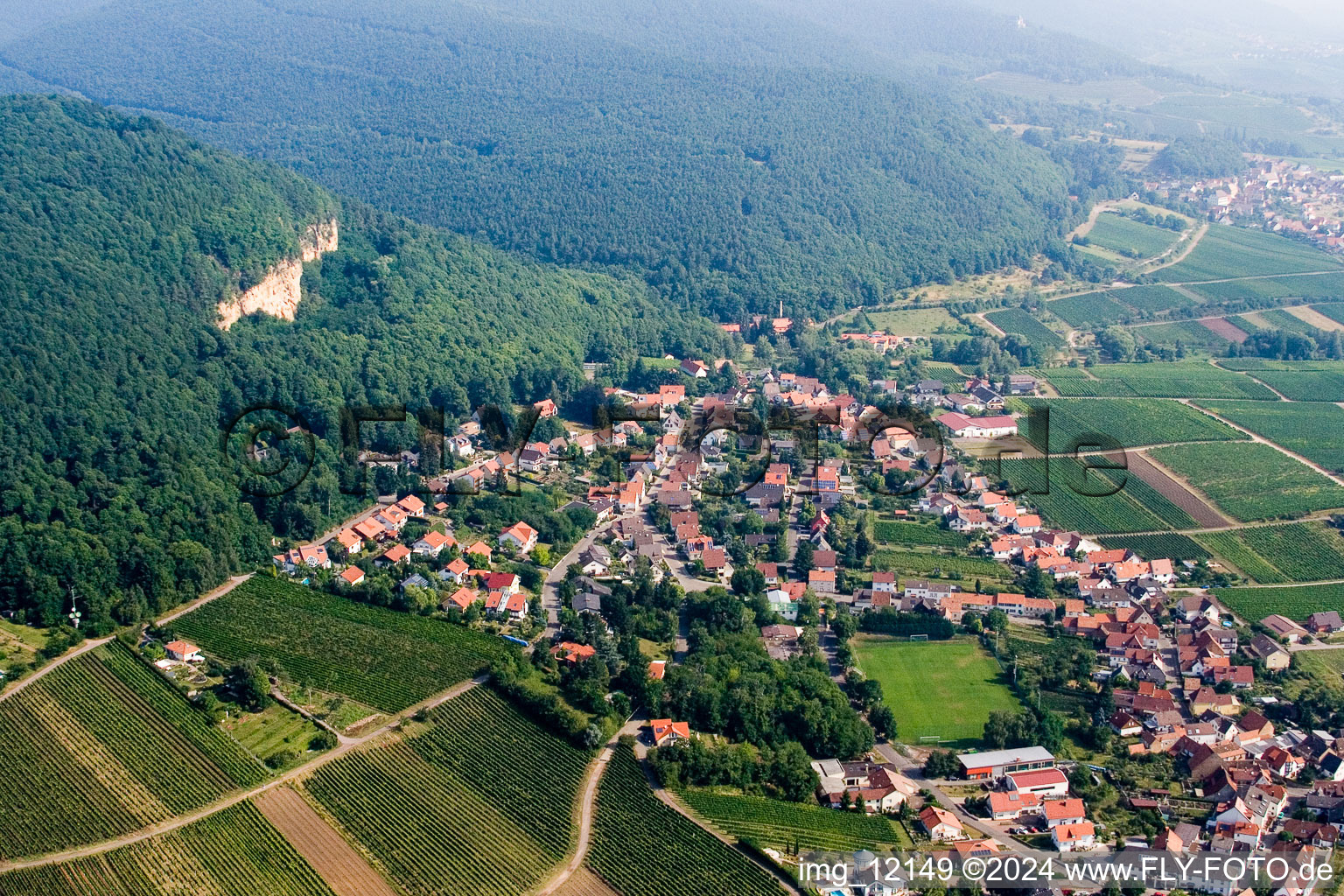 Village - view on the edge of agricultural fields and farmland in Frankweiler in the state Rhineland-Palatinate