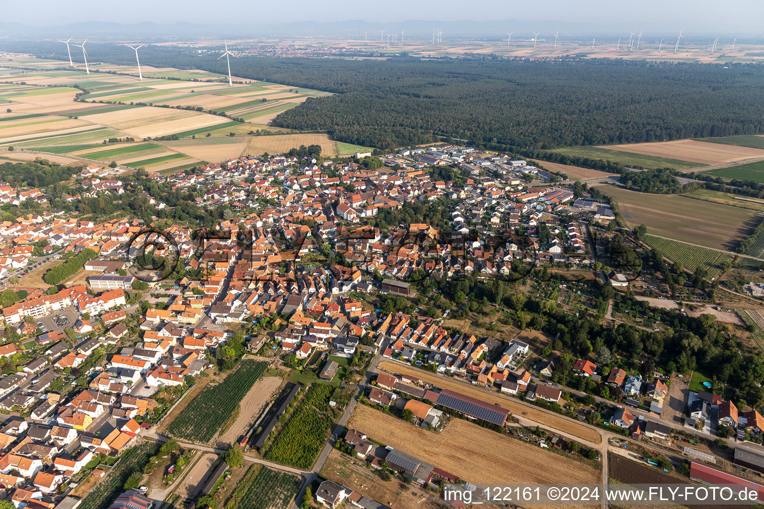 Village view on the edge of agricultural fields and land in Rheinzabern in the state Rhineland-Palatinate, Germany