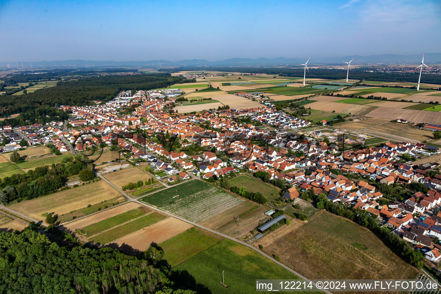 Village view on the edge of agricultural fields and land in Hatzenbuehl in the state Rhineland-Palatinate, Germany