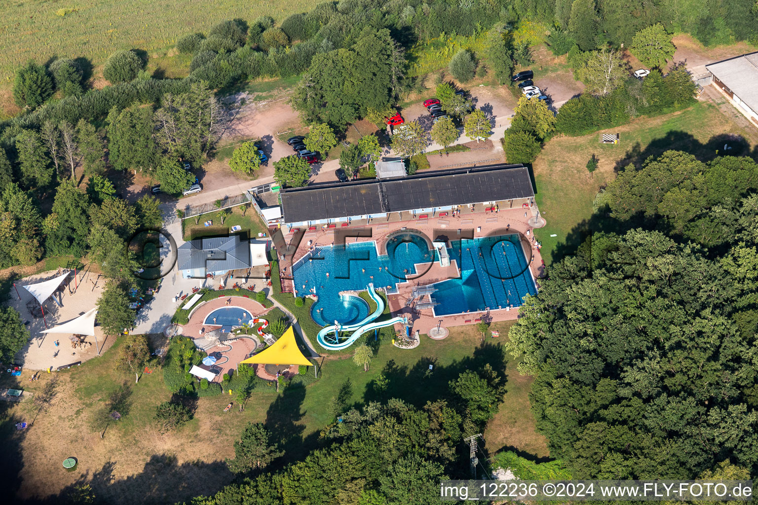 Only a few guests on the Waterslide on Swimming pool of the Waldschwimmbad Kandel due to the Corona-Pandemic in Kandel in the state Rhineland-Palatinate, Germany