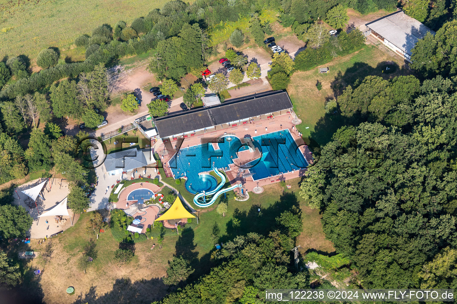 Waterslide on Swimming pool of the Waldschwimmbad Kandel in Kandel in the state Rhineland-Palatinate, Germany