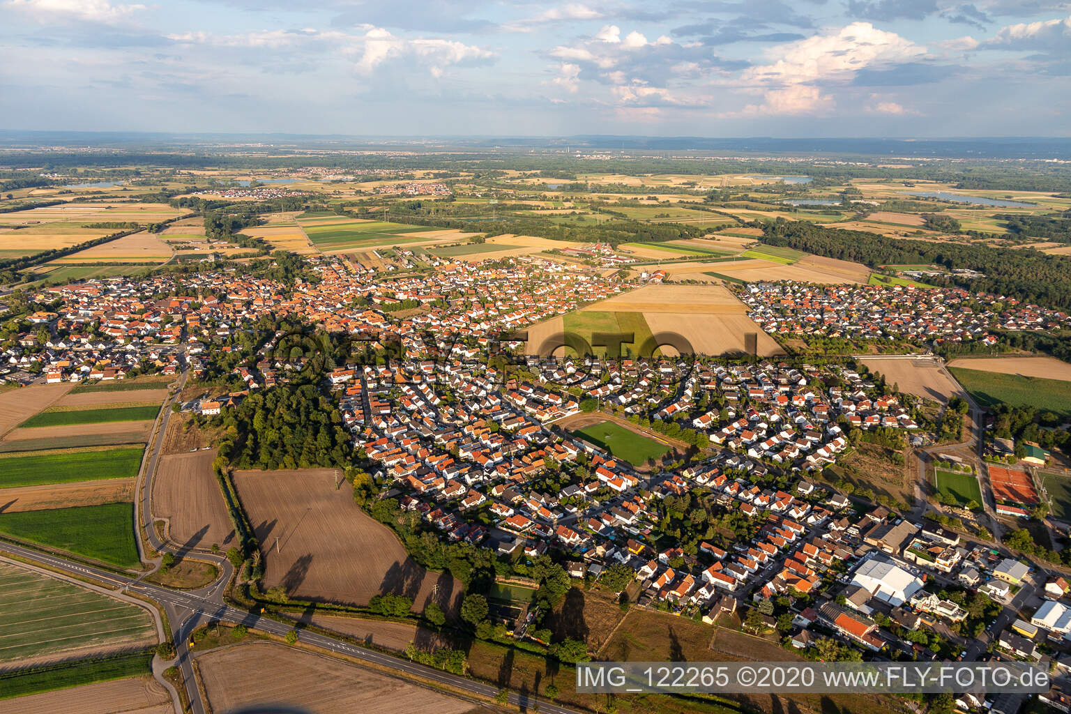 Aerial view of Village view on the edge of agricultural fields and land in Rheinzabern in the state Rhineland-Palatinate, Germany
