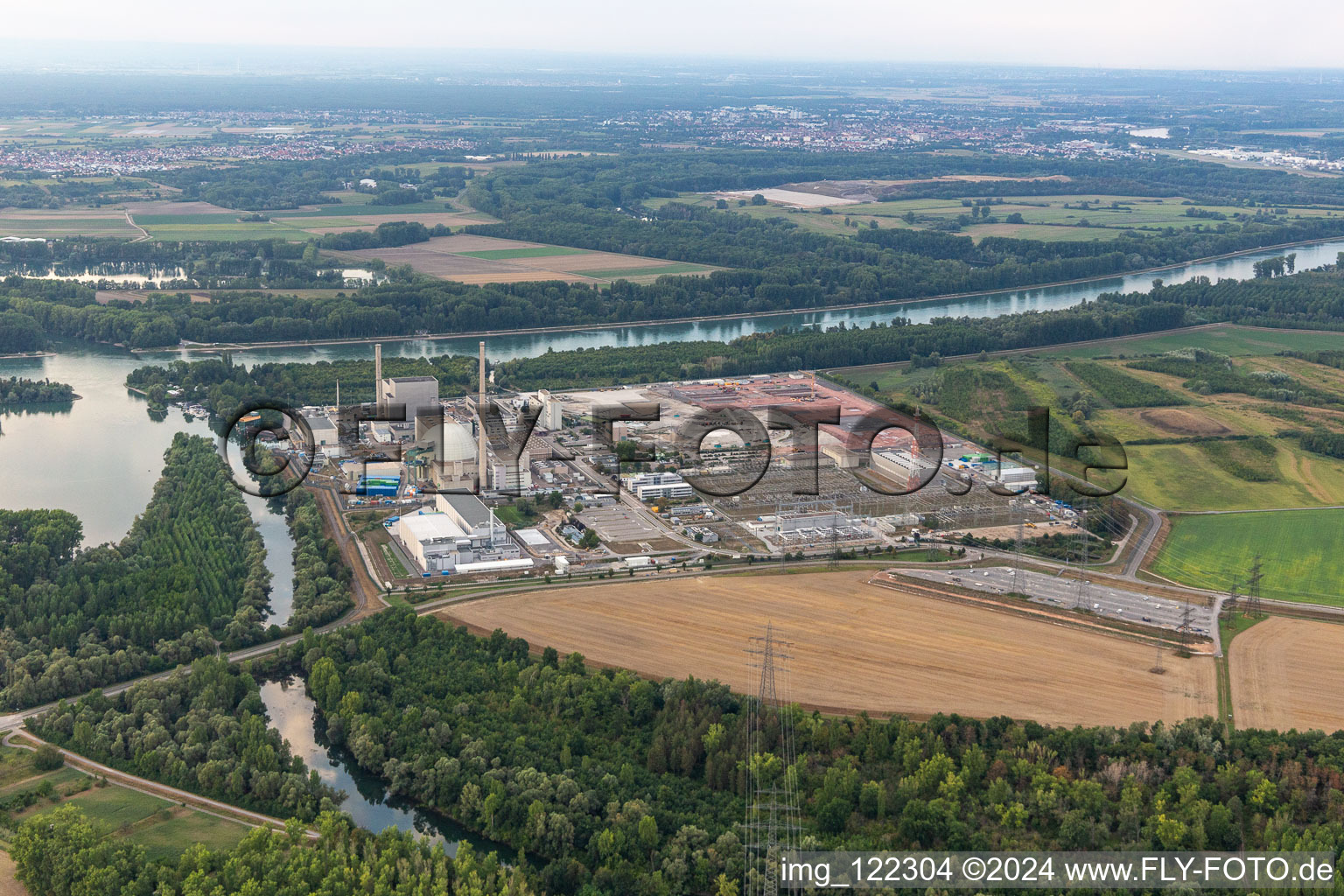 Remains of the decommissioned reactor blocks and facilities of the nuclear power plant - KKW Kernkraftwerk EnBW Kernkraft GmbH, Philippsburg nuclear power plant and rubble of the two cooling towers in Philippsburg in the state Baden-Wuerttemberg, Germany from above