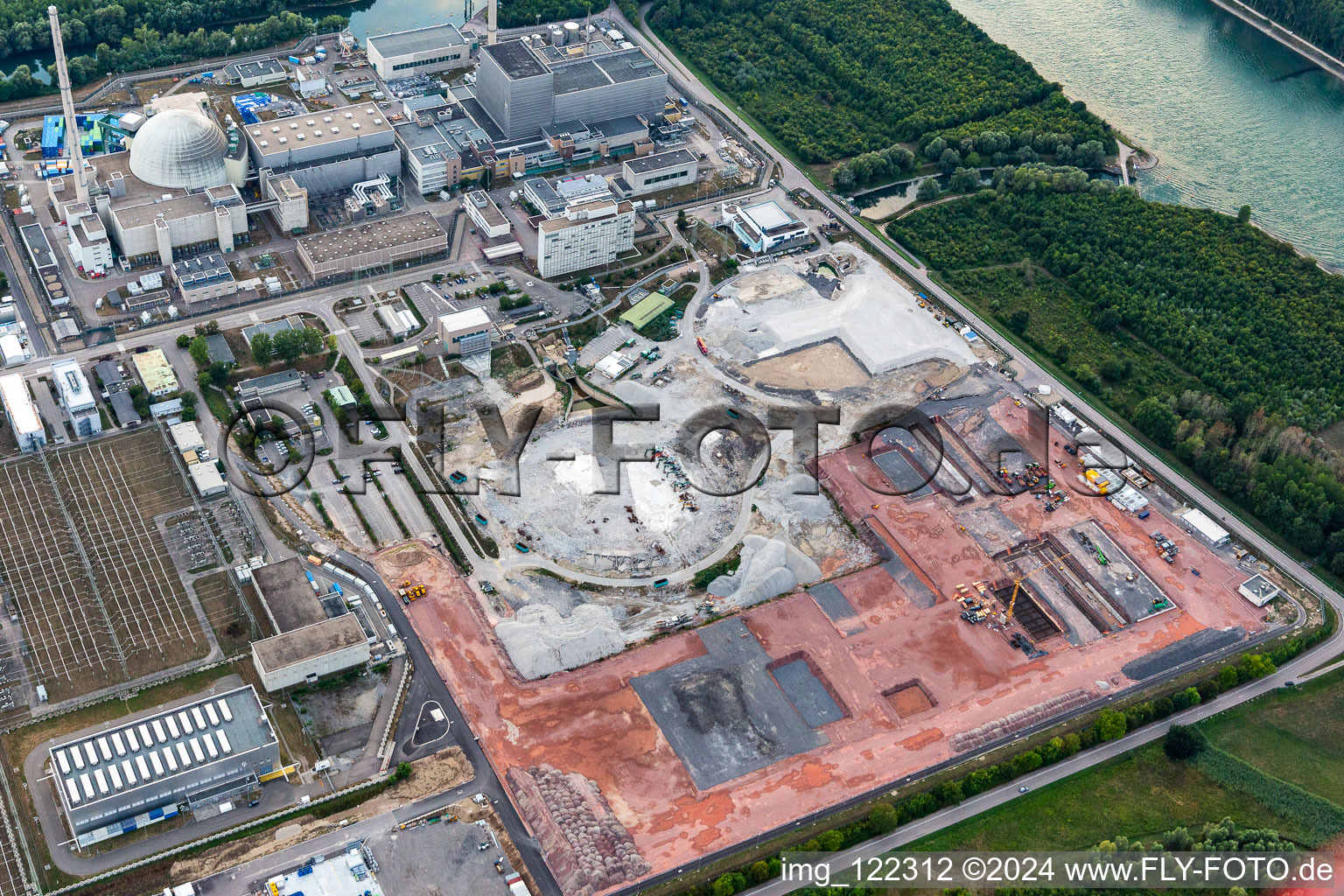 Aerial view of Remains of the decommissioned reactor blocks and facilities of the nuclear power plant - KKW Kernkraftwerk EnBW Kernkraft GmbH, Philippsburg nuclear power plant and rubble of the two cooling towers in Philippsburg in the state Baden-Wuerttemberg, Germany