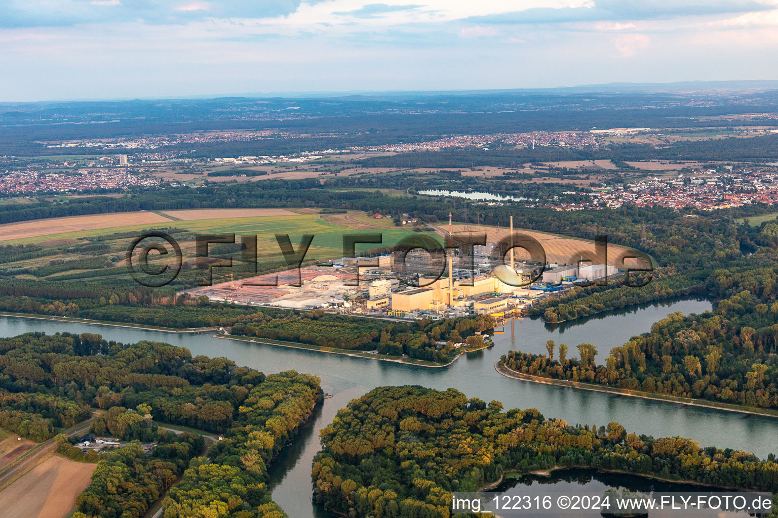 Remains of the decommissioned reactor blocks and facilities of the nuclear power plant - KKW Kernkraftwerk EnBW Kernkraft GmbH, Philippsburg nuclear power plant and rubble of the two cooling towers at the shore of the Rhine river in Philippsburg in the state Baden-Wuerttemberg, Germany