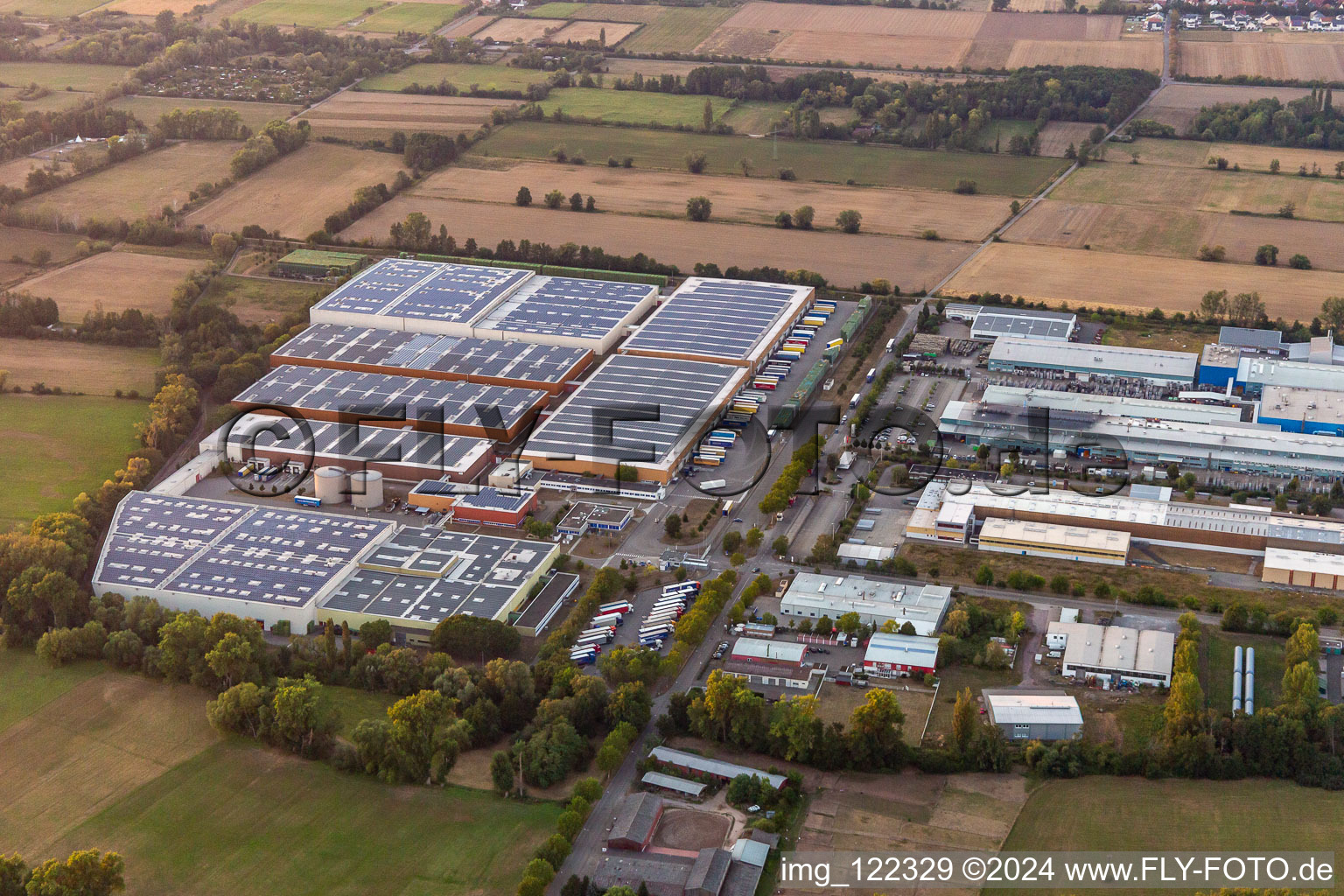 Oblique view of Industrial and commercial area Landau Ost with Michelin Tires and APL Automobil-Prueftechnik Landau GmbH in Landau in der Pfalz in the state Rhineland-Palatinate, Germany