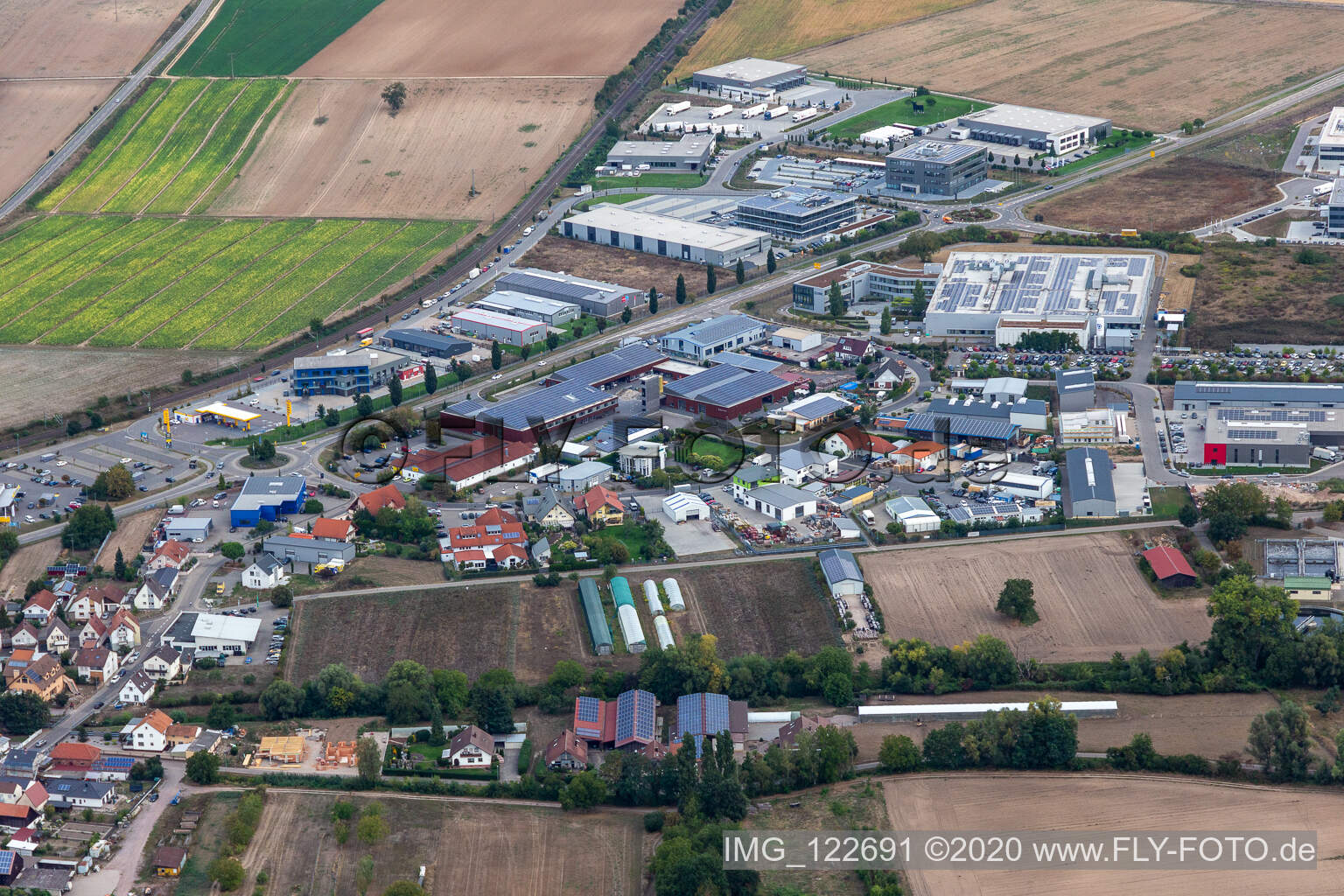 Aerial view of Industrial and commercial area Nord with ITK Engineering GmbH, DBK David + Baader, Transac und Fischer Fahrradmarke in Ruelzheim in the state Rhineland-Palatinate, Germany