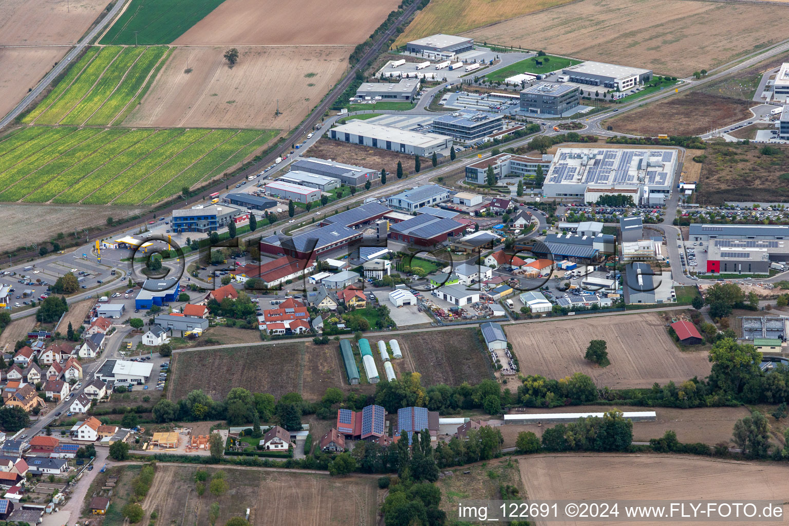 Aerial view of Industrial and commercial area Nord with ITK Engineering GmbH, DBK David + Baader, Transac und Fischer Fahrradmarke in Ruelzheim in the state Rhineland-Palatinate, Germany