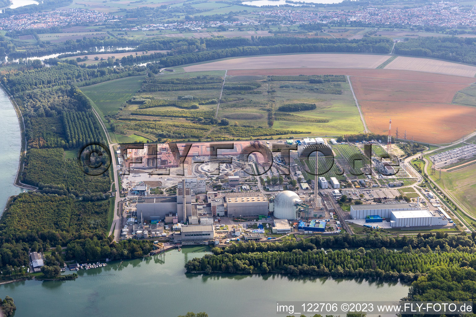 Aerial photograpy of ENBW nuclear power plant under dismantling with construction site for the direct current converter in Philippsburg in the state Baden-Wuerttemberg, Germany