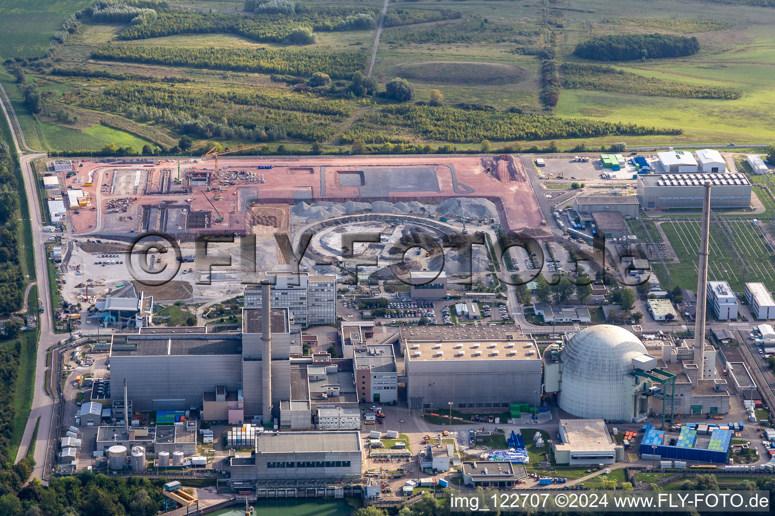 Oblique view of ENBW nuclear power plant under dismantling with construction site of the DC converter in Philippsburg in the state Baden-Wuerttemberg, Germany