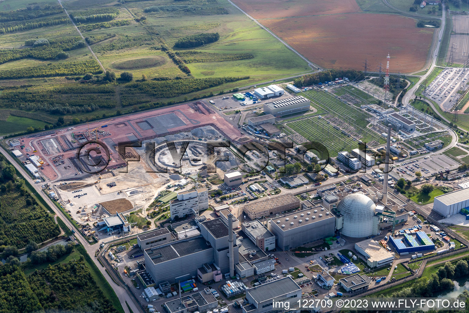 ENBW nuclear power plant under dismantling with construction site for the direct current converter in Philippsburg in the state Baden-Wuerttemberg, Germany from above