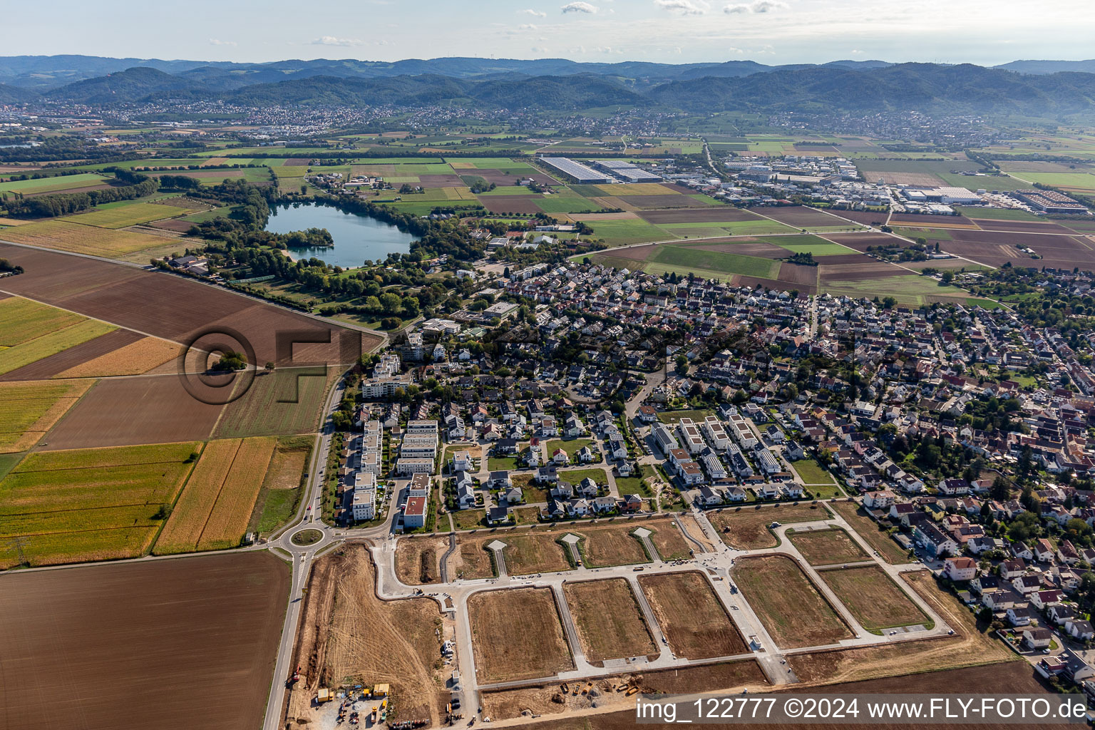 New development area "Mitten im Feld in Heddesheim in the state Baden-Wuerttemberg, Germany seen from above