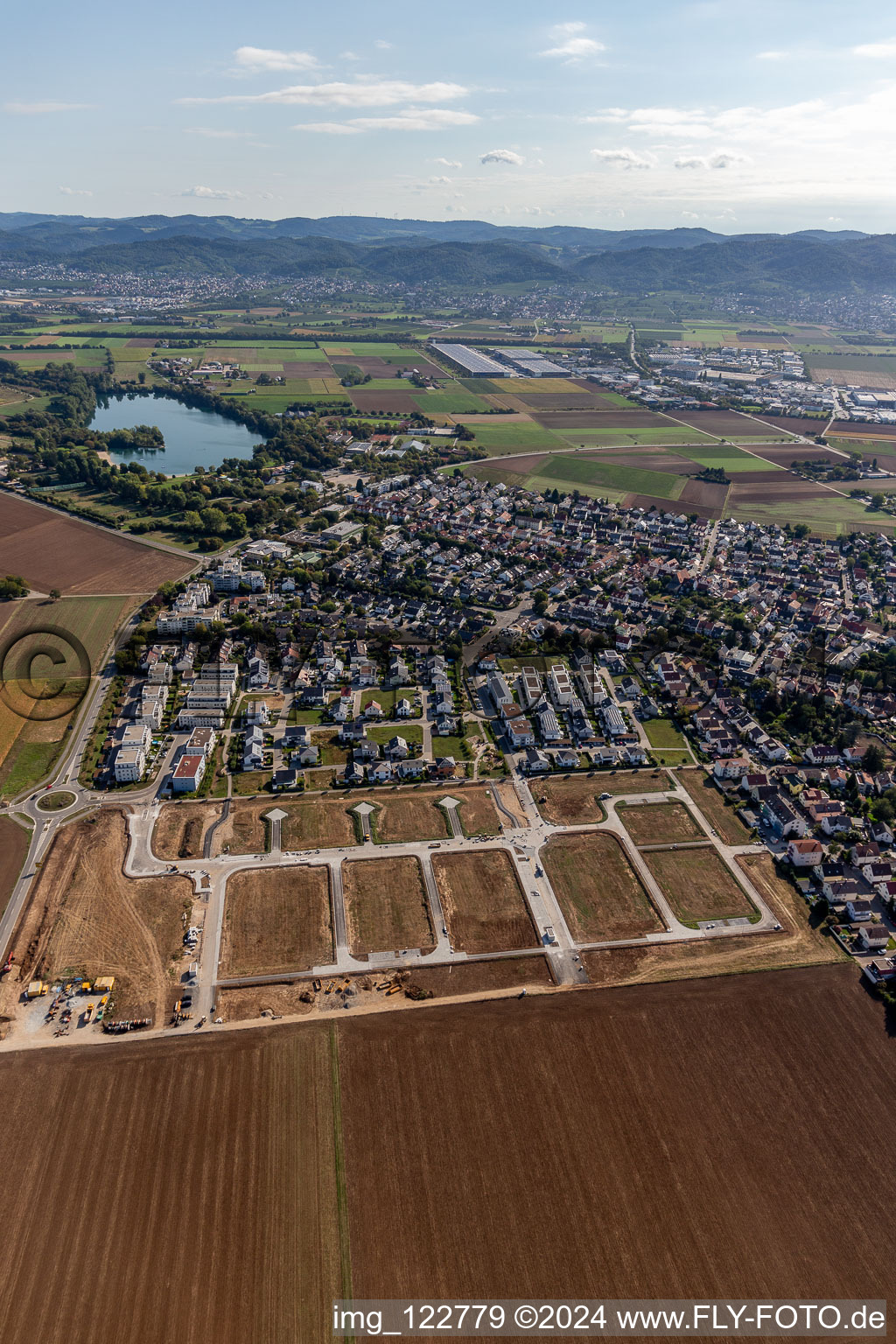 New development area "Mitten im Feld in Heddesheim in the state Baden-Wuerttemberg, Germany from the plane