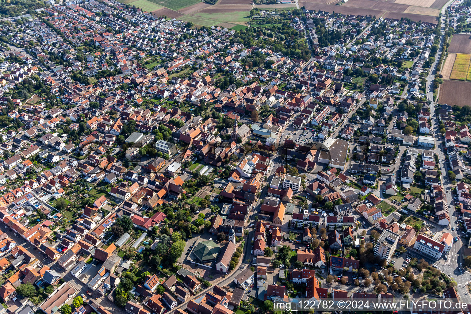 City view on down town with St. Remigius - Neue Kirche in Heddesheim in the state Baden-Wuerttemberg, Germany