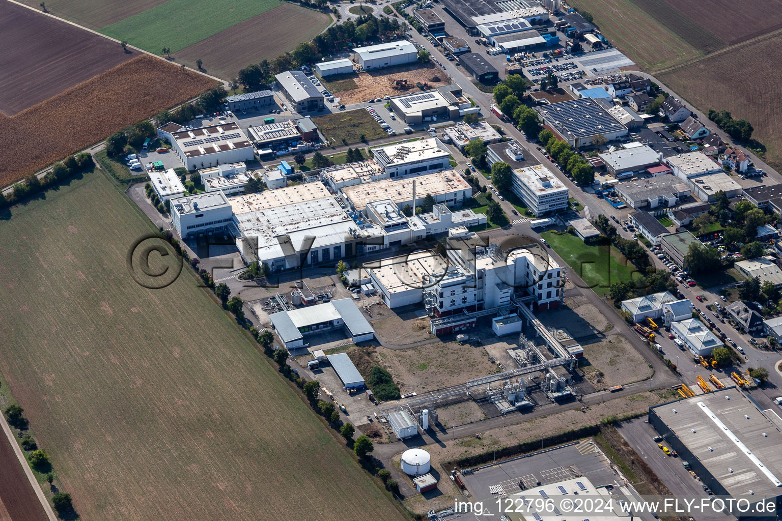 Building and production halls on the premises of the brewery Weldebraeu GmbH&Co.KG, Corden Pharma GmbH, AHA!Print and Autohaus Maeulen Christian Maeulen e.K. in Plankstadt in the state Baden-Wuerttemberg, Germany