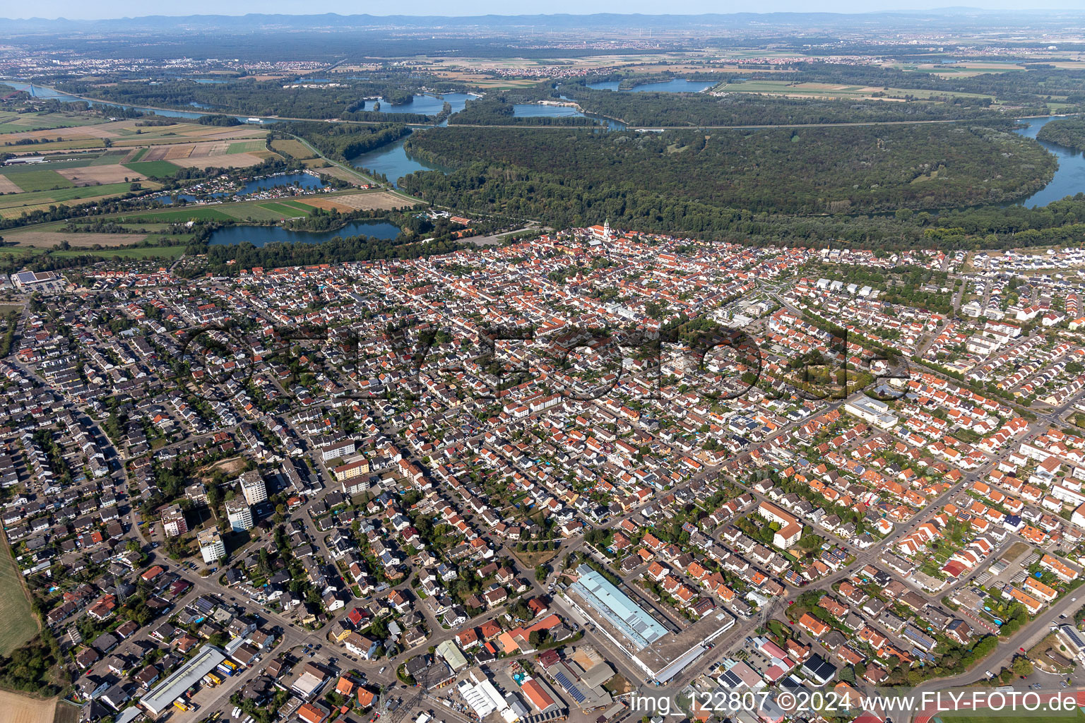 Town on the banks of the river of the old bed of the Rhine river in Ketsch in the state Baden-Wuerttemberg, Germany