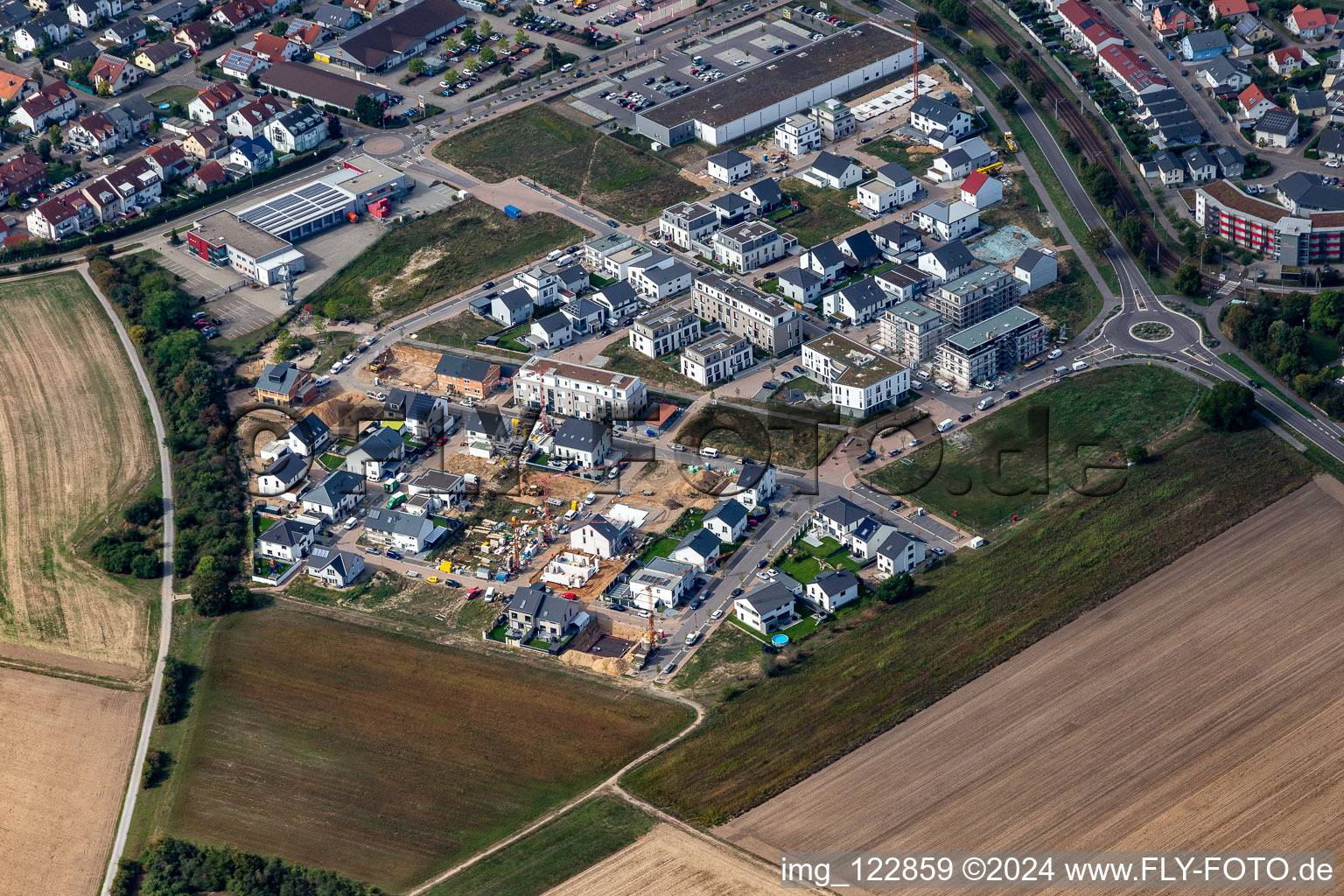 Aerial view of Construction site to build a new multi-family residential complex Quartier 2020 development area Biegen-Durlacher Weg in Hochstetten in the state Baden-Wuerttemberg, Germany