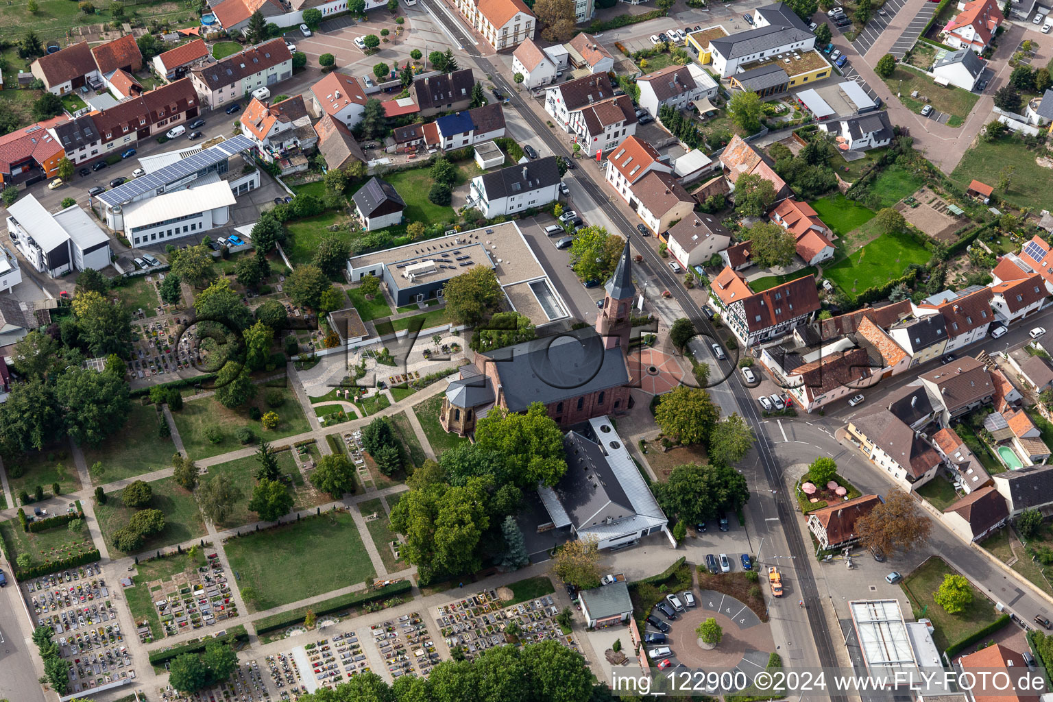 Grave rows on the grounds of the cemetery of Ev. Kirche Linkenheim in Linkenheim in the state Baden-Wuerttemberg, Germany