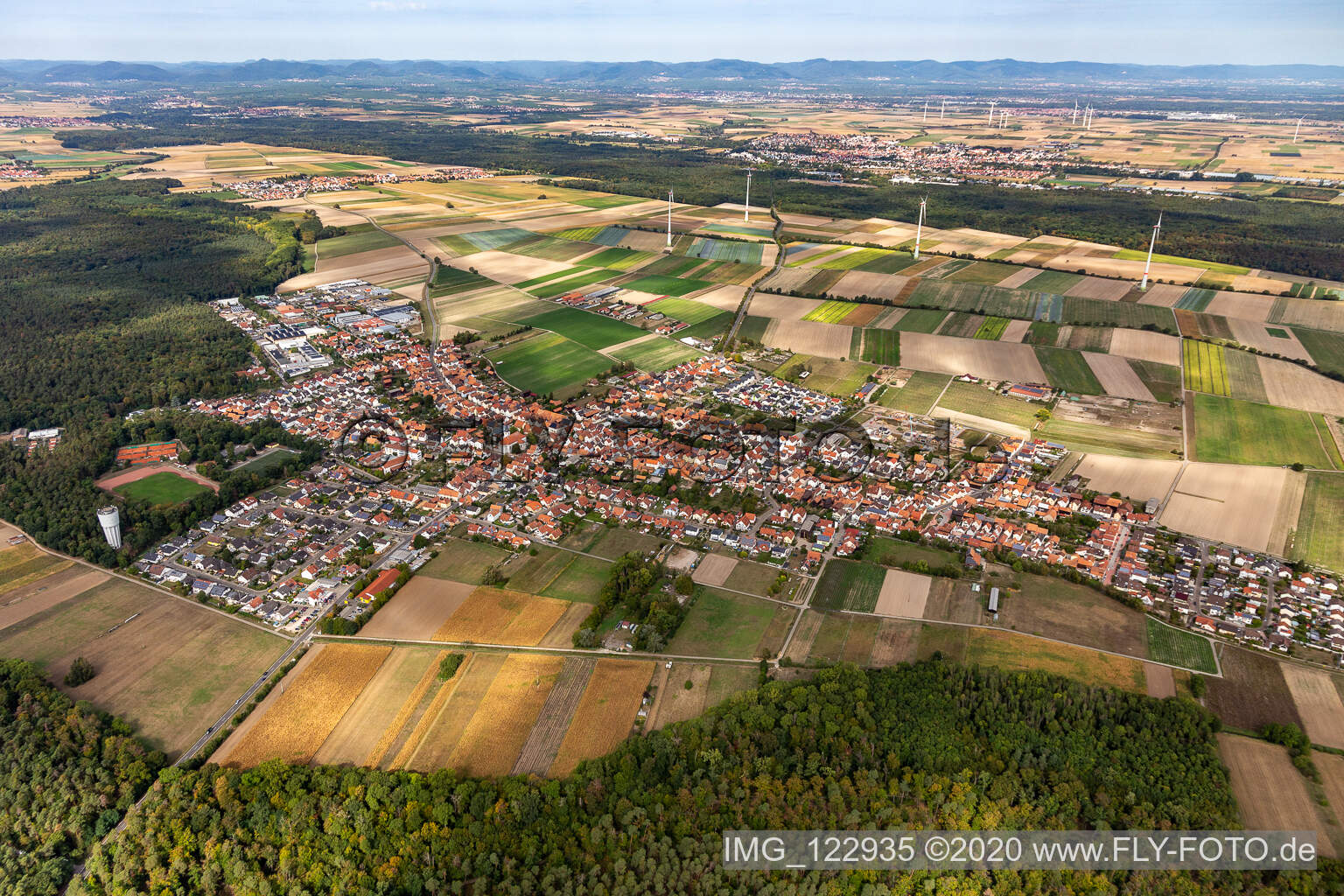 Aerial view of Village view on the edge of agricultural fields and land in Hatzenbuehl in the state Rhineland-Palatinate, Germany